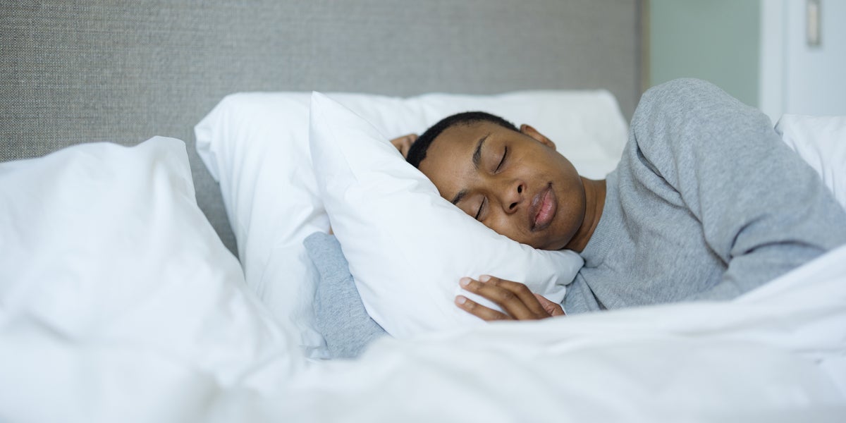 Doctors Share The Surprising Pros And Cons Of Propping Up Your Head To Sleep