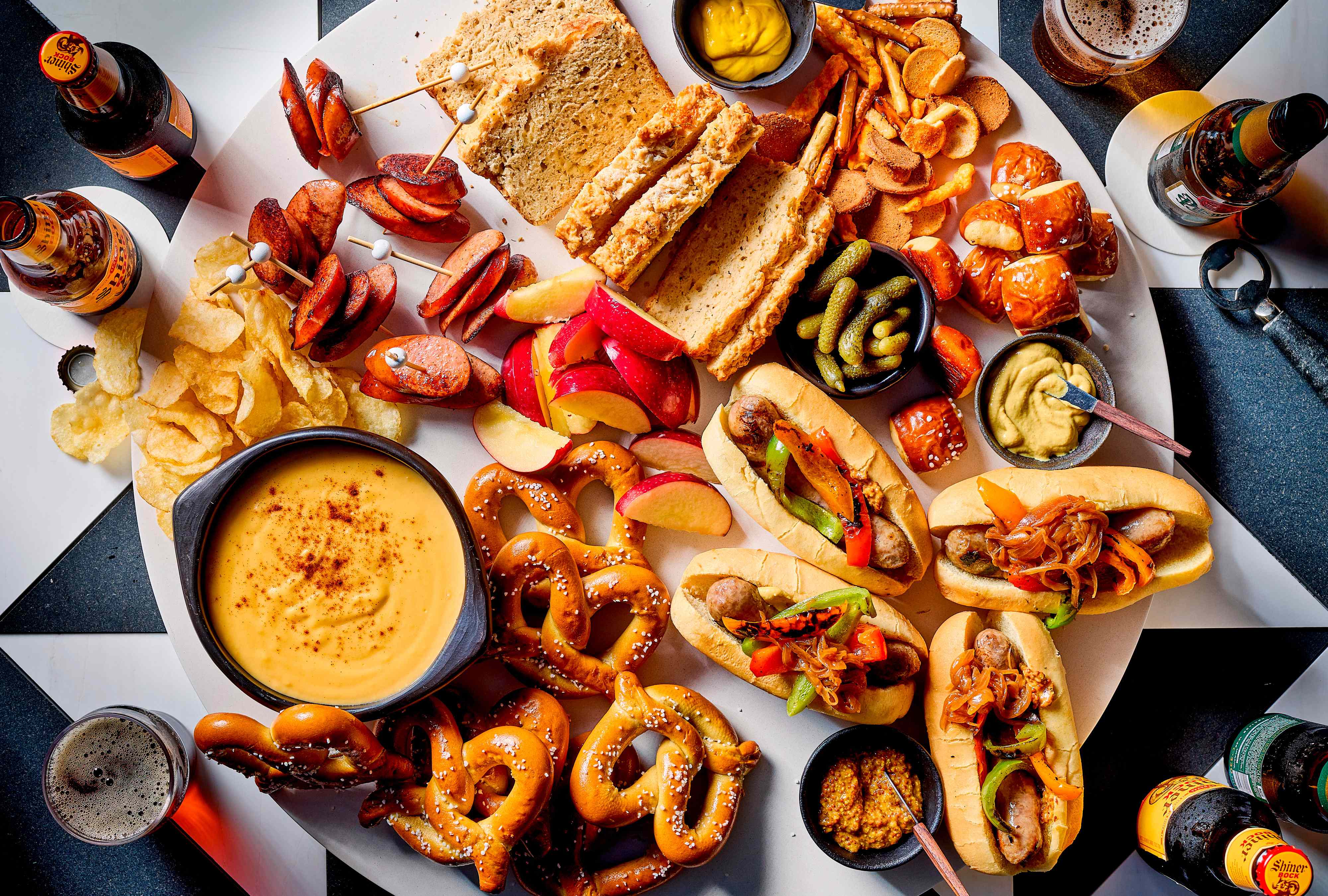 Beer-Cheese Dip, Pretzels, and Sausage Make This the Ultimate Pub Crawl Board
