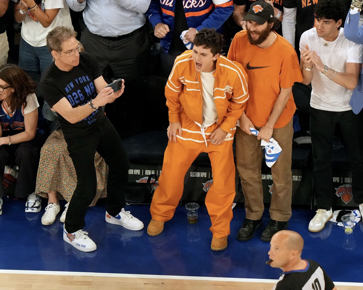 Timothee Chalamet (C) cheers courtside during Game 3 of the 2026 NBA Finals.Credit: Erick W. Rasco/Sports Illustrated via Getty Images
