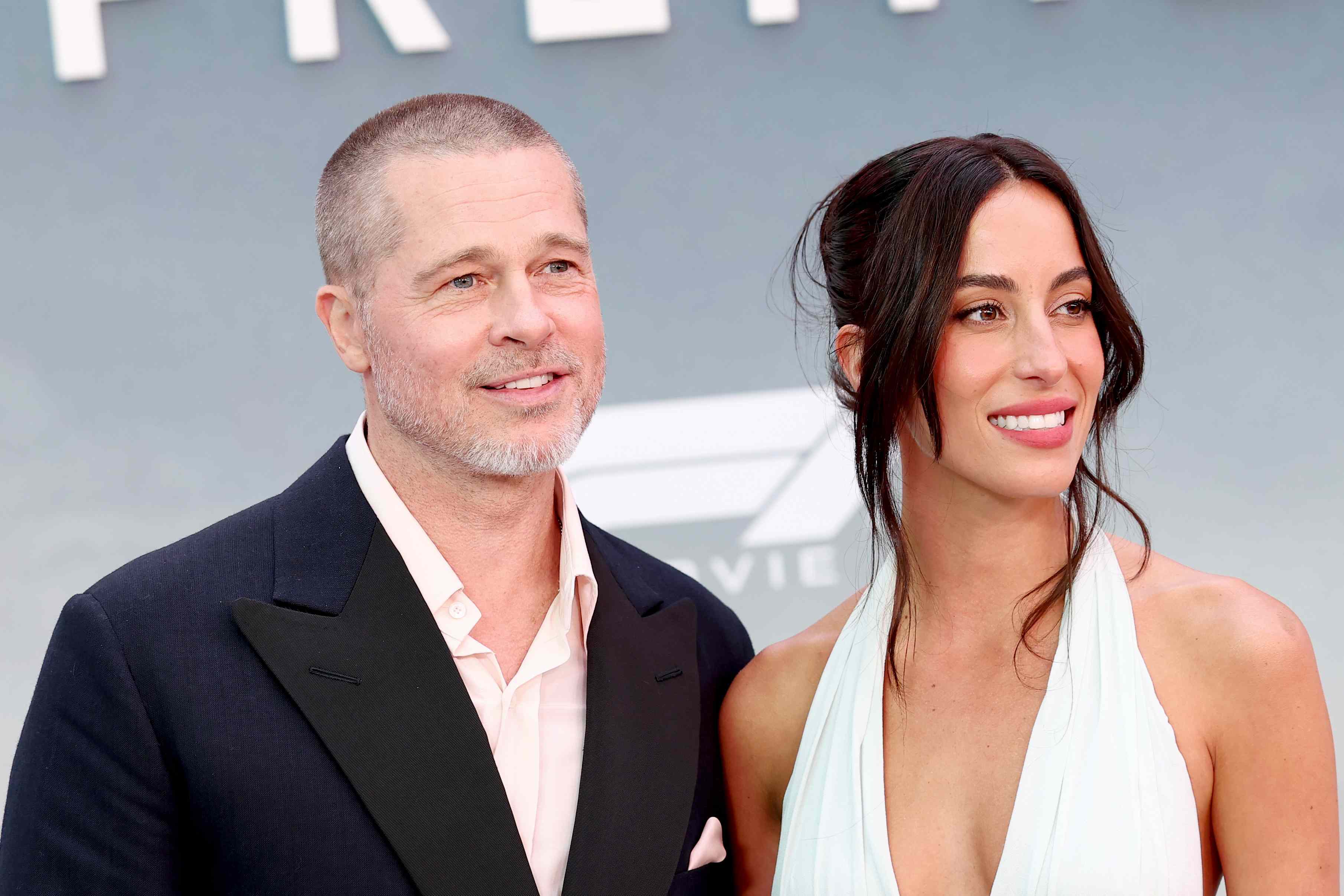 Brad Pitt, 62, and Ines de Ramon, 33, Pack on the PDA as They Coordinate in Colorfully Bold Outfits