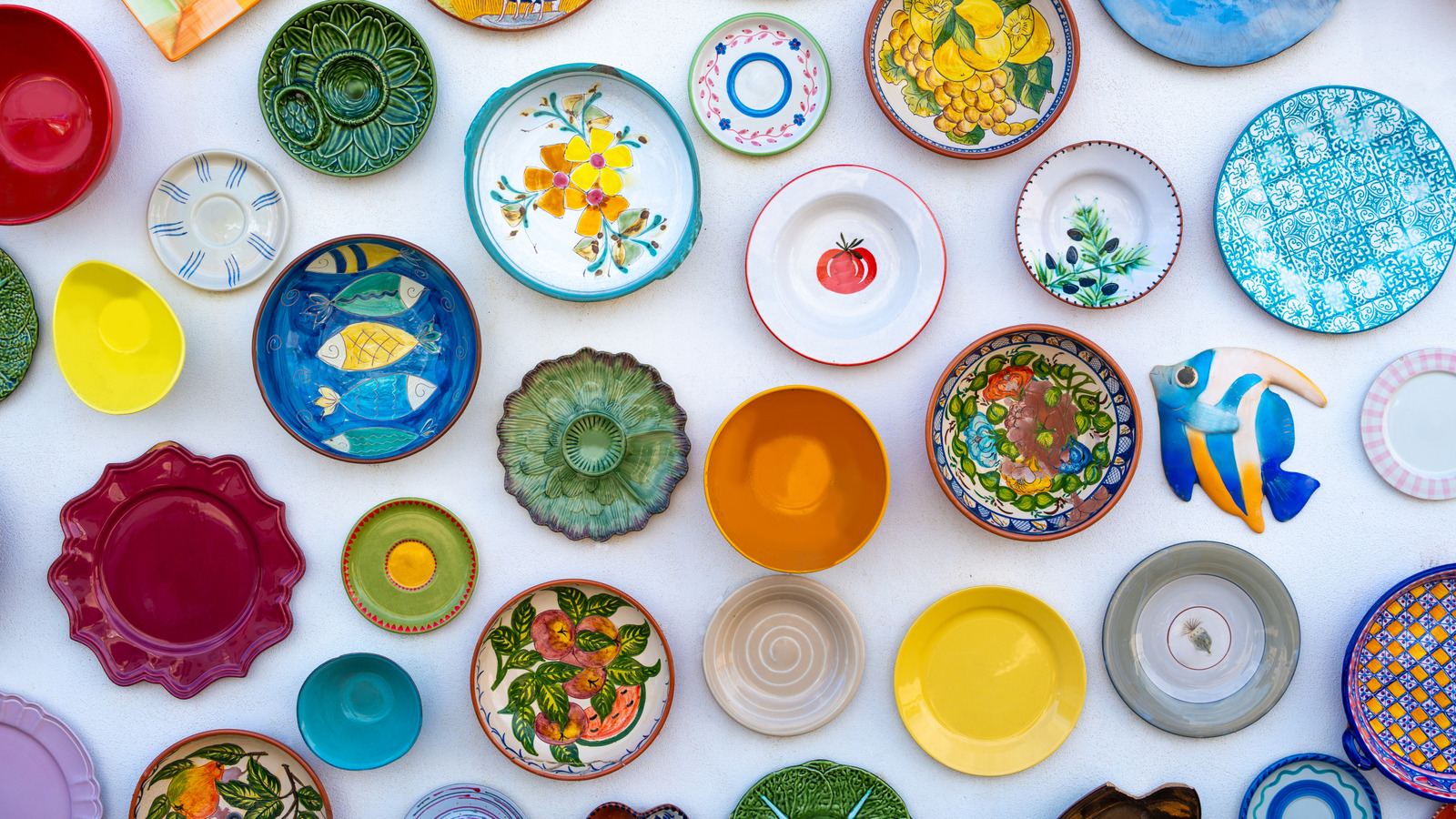 Put Your Favorite Dishes On Display By Repurposing An Old Towel Bar