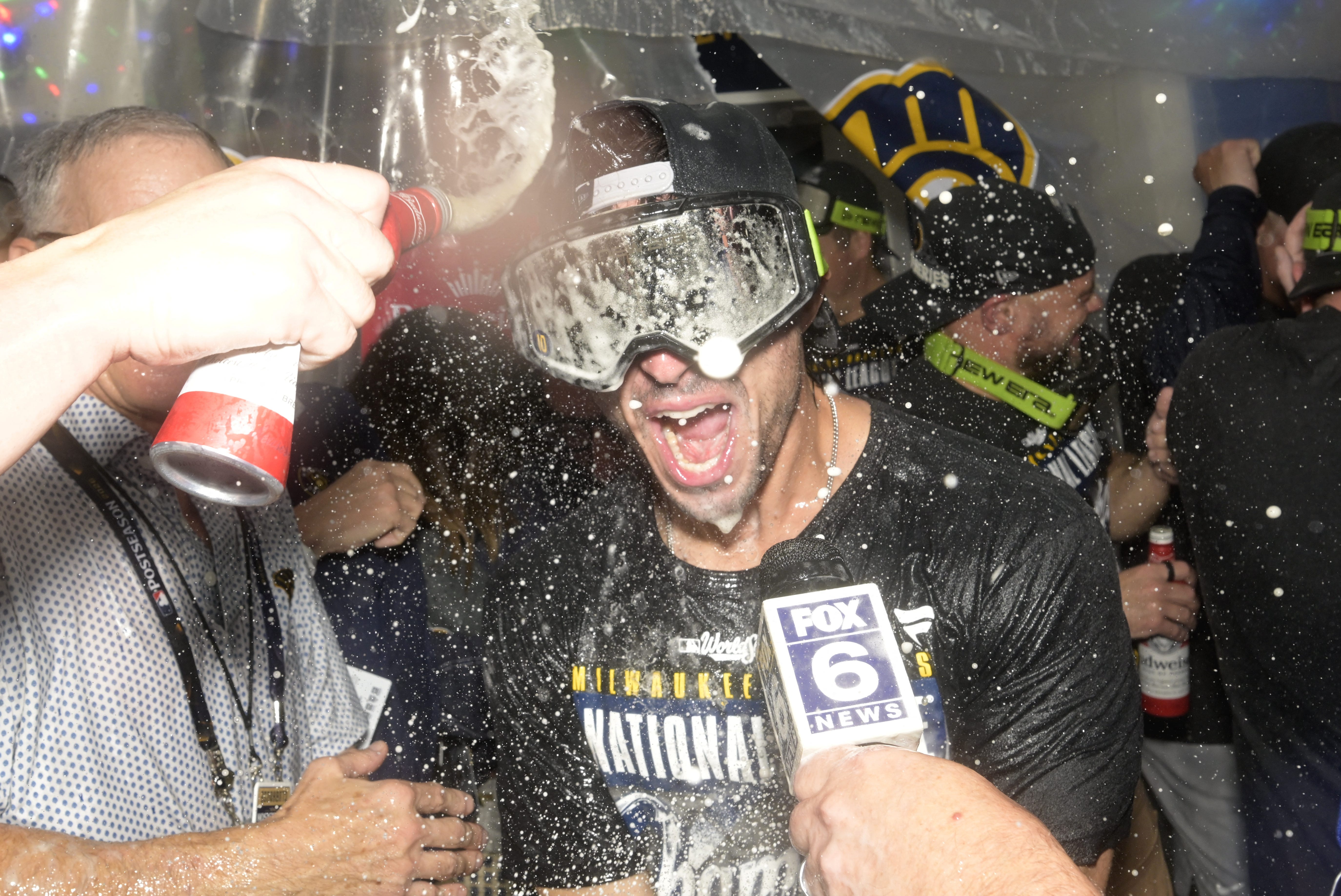 Watch Brewers' wild celebrations for NL pennant after sweeping Dodgers