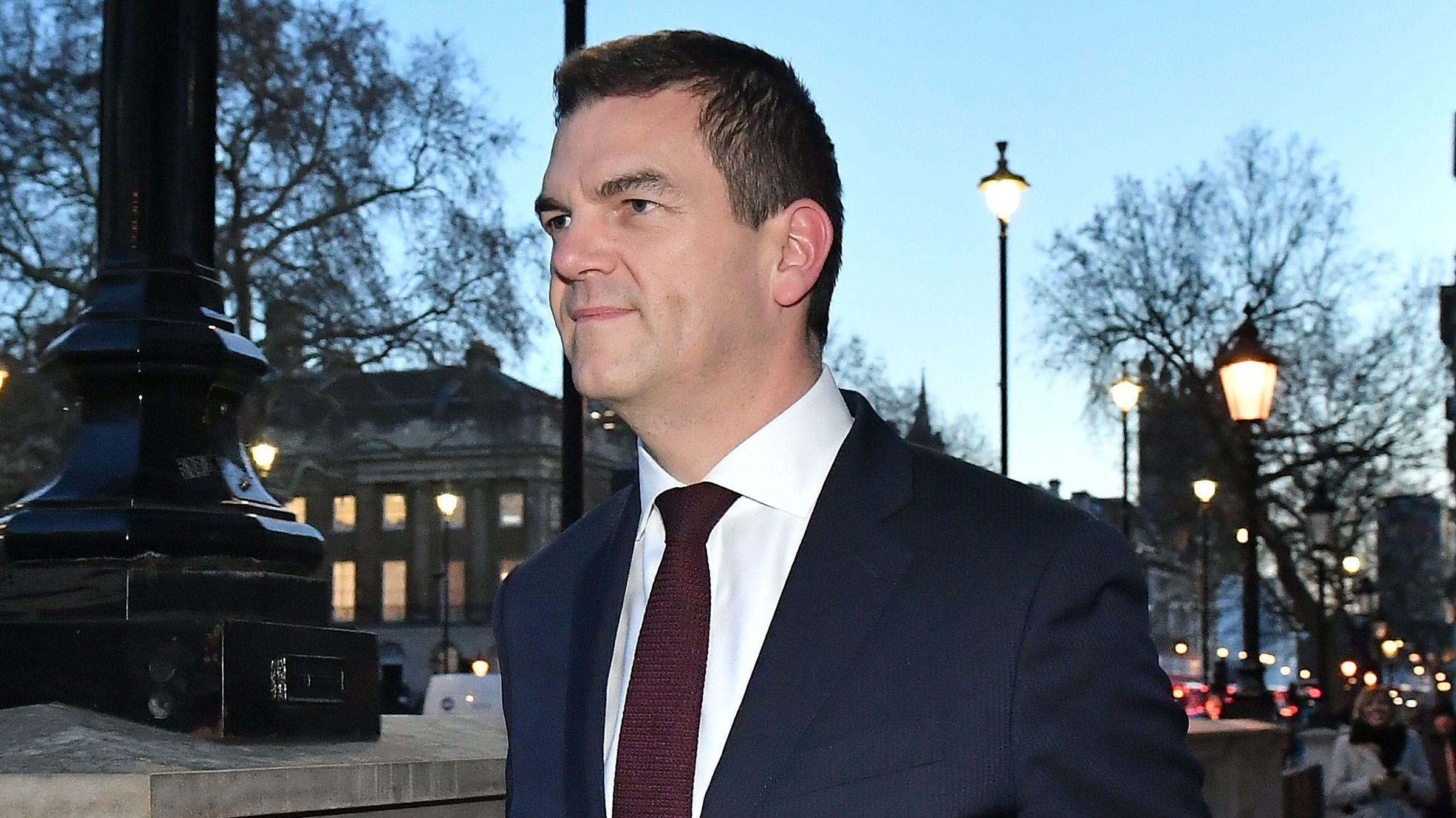 Ex-top official Robbins reaches settlement with government over sacking