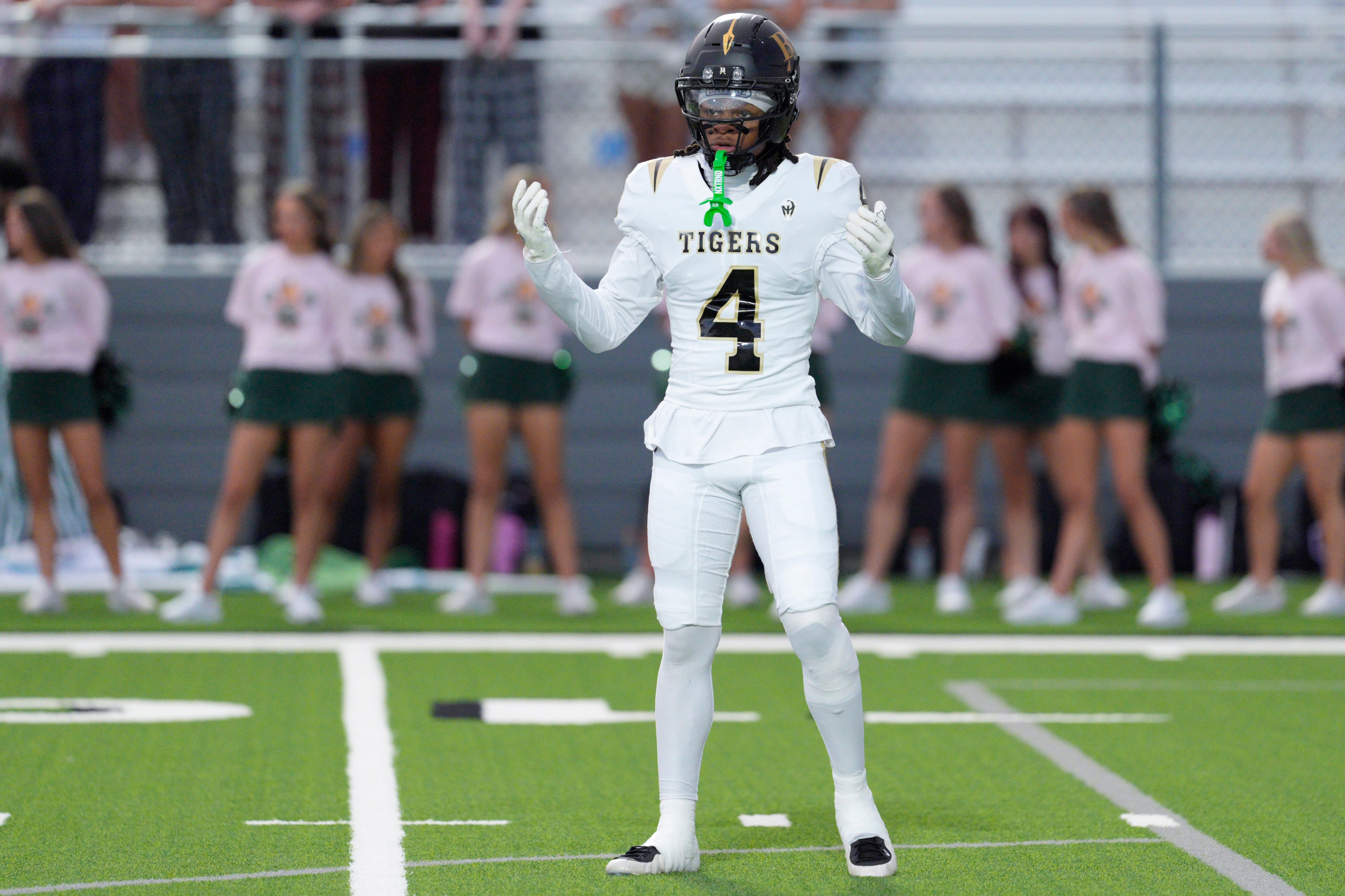 Broken Arrow's Semaj Stanford stands on the field during a high school football game between Norman North and Broken Arrow in Norman, Okla., Friday, Sept. 25, 2026.