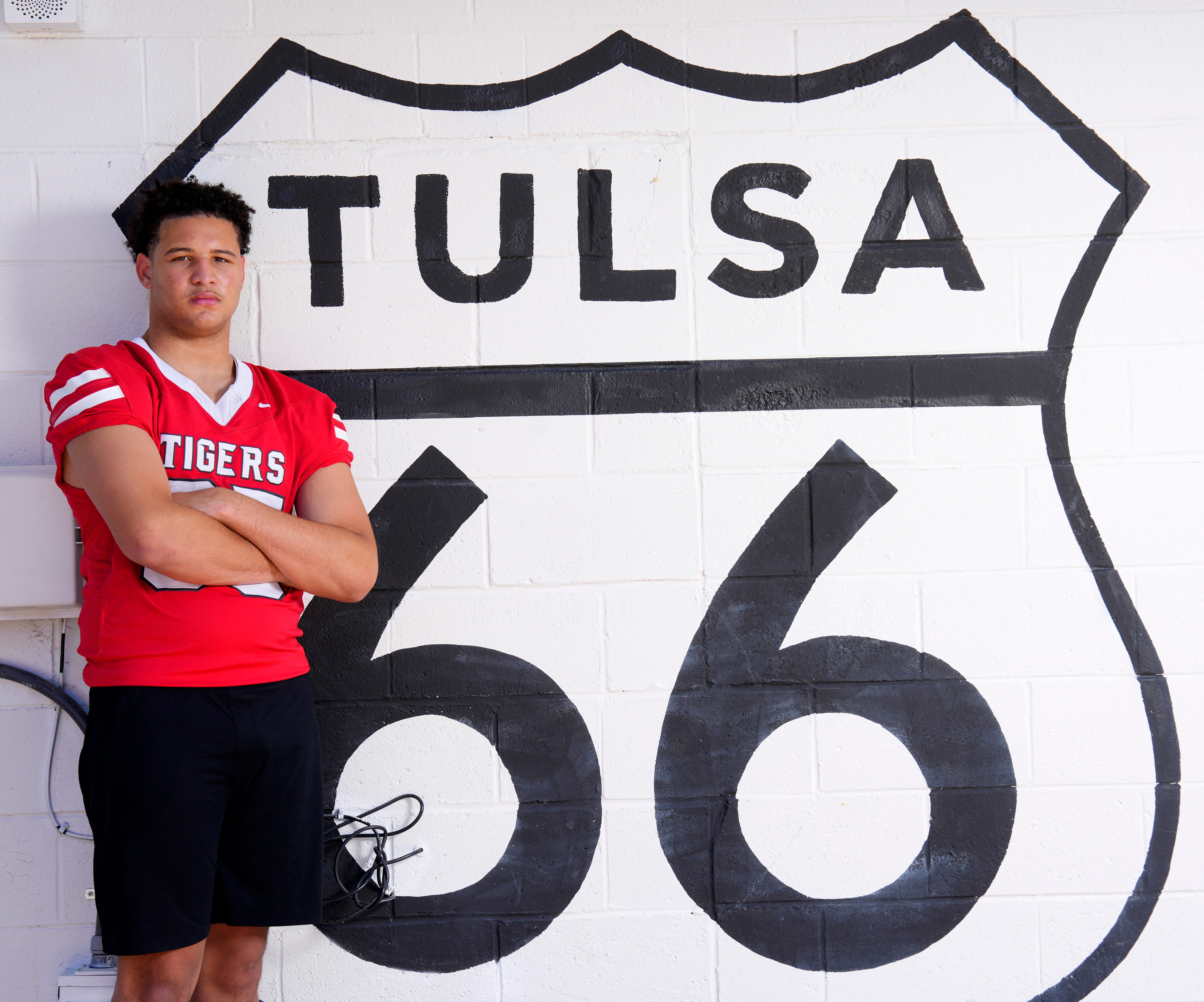 Super 30 player, Fort Gibson senior offensive lineman and OU commit Cooper Hackett, at Buck Atom’s Cosmic Curios in the Meadow Gold District along Route 66 in Tulsa, Monday, June 15, 2026.