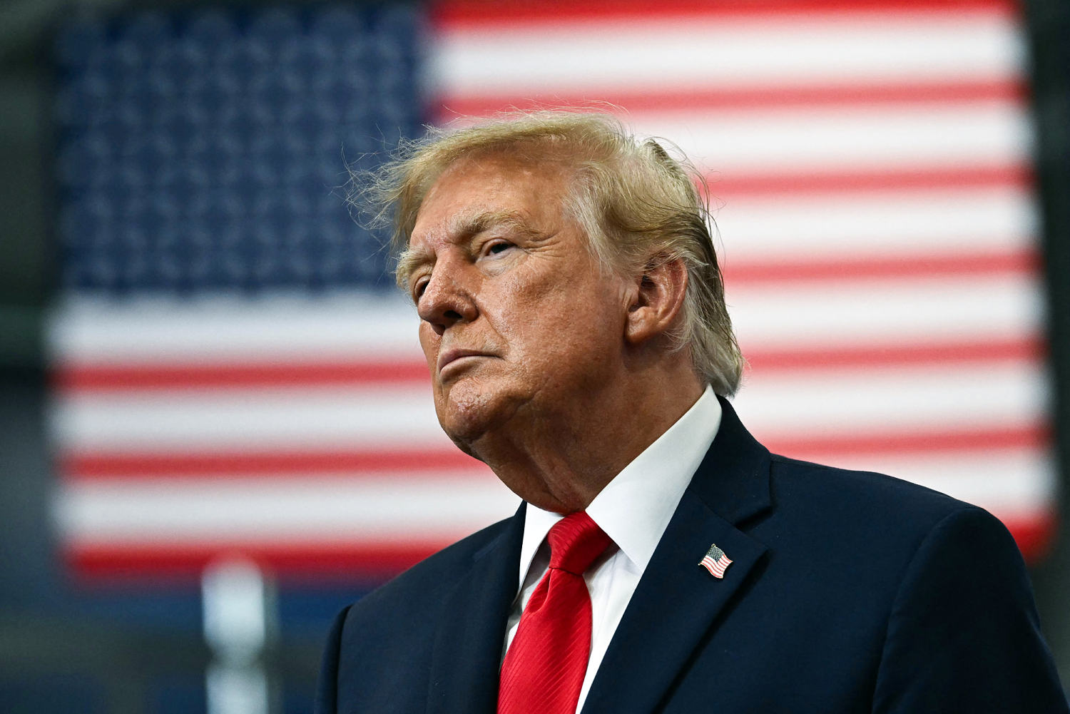 Trump waives new Russia sanctions following deal to purchase diesel , citing national interests