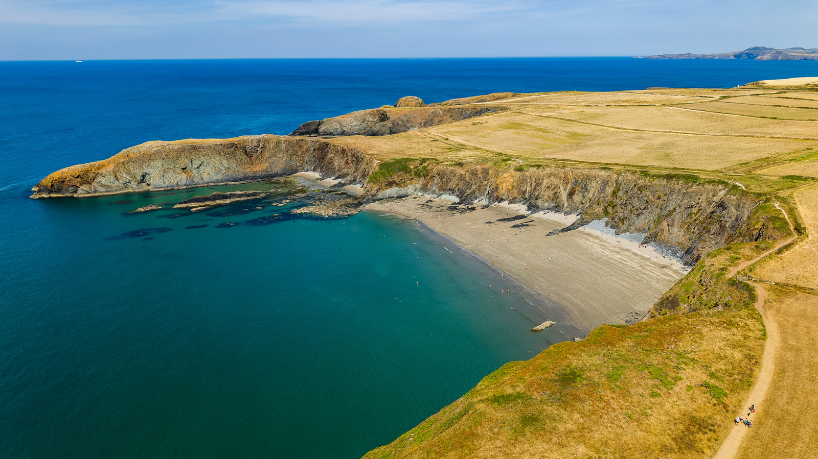 Along One Of The UK's Best Coastlines Is A National Park With Fresh Seafood, Gorgeous Beaches, And Scenic Cliffs