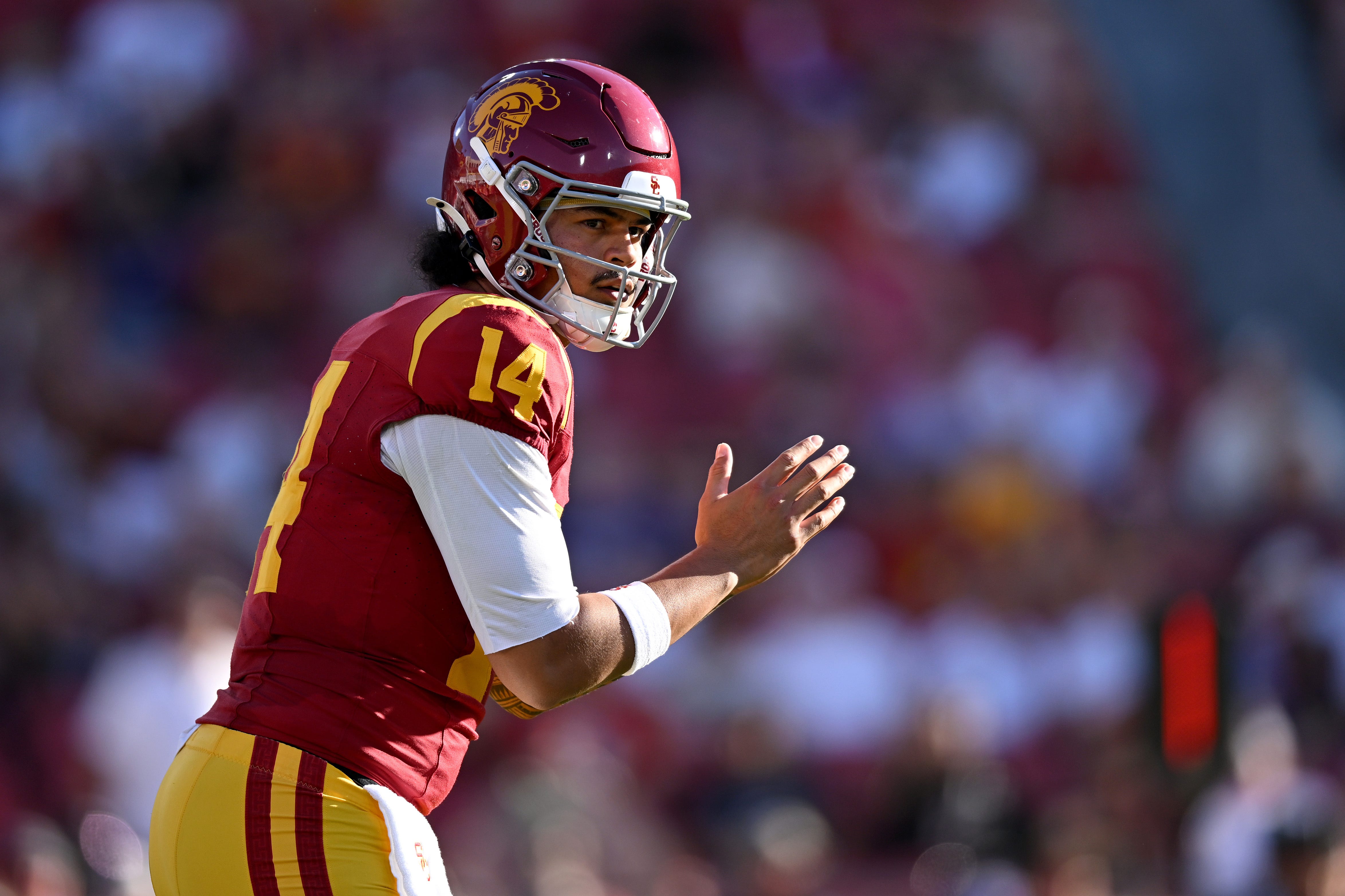 Oct 3, 2026; Los Angeles, California, USA;  USC Trojans quarterback Jayden Maiava (14) reacts against the Washington Huskies during the first quarter at United Airlines Field at Los Angeles Memorial Coliseum.  Mandatory Credit: Griffin Hooper-Imagn Images