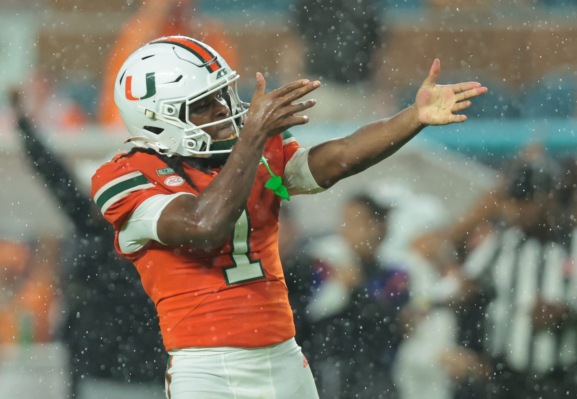 Oct 17, 2026; Miami Gardens, Florida, USA;  Miami Hurricanes wide receiver Malachi Toney (1) makes a catch during the first quarter against the Florida State Seminoles at Hard Rock Stadium.  Mandatory Credit: Sam Navarro-Imagn Images
