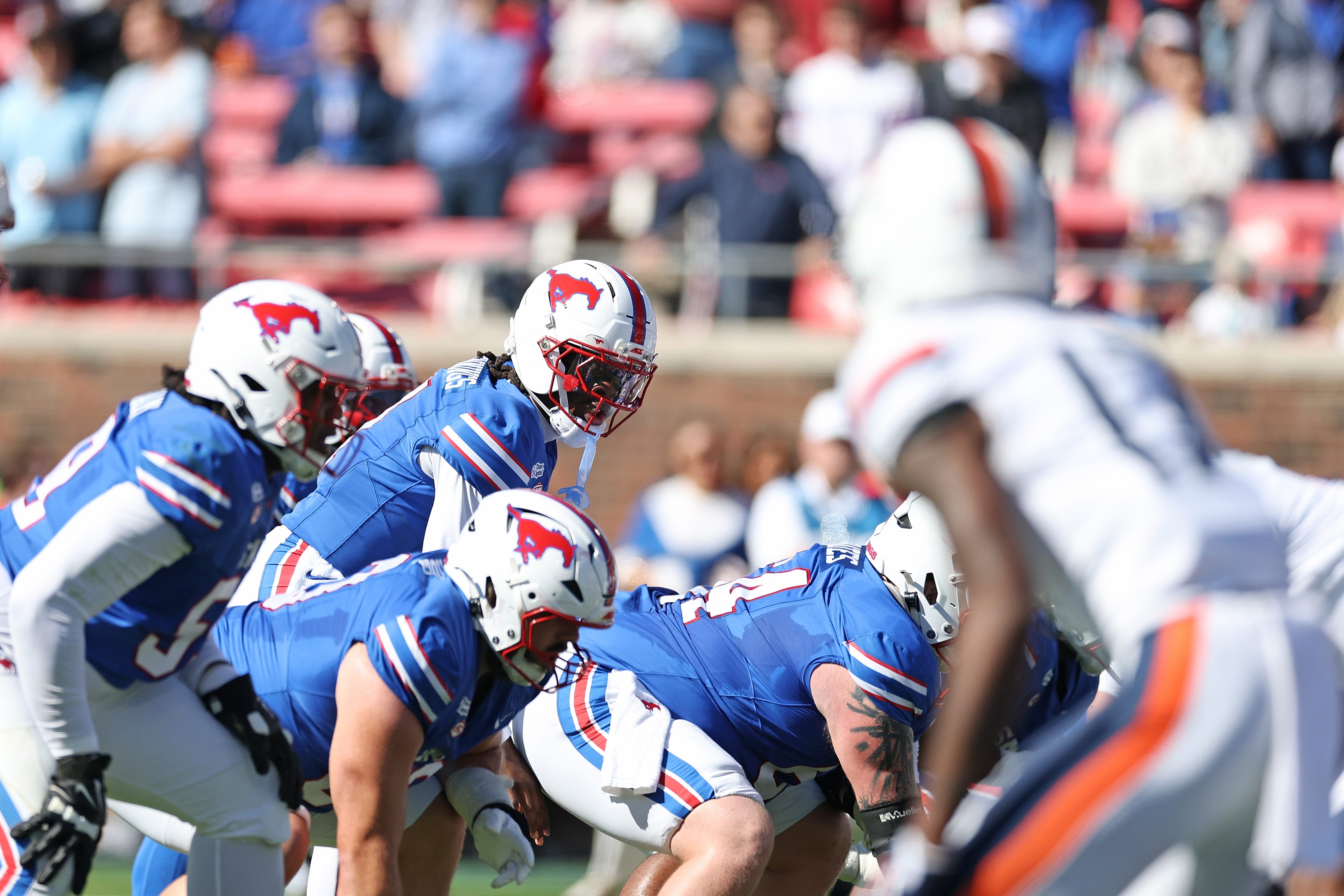 Kevin Jennings of the SMU Mustangs steps to the line of scrimmage during the first half against the Virginia Cavaliers at Gerald J. Ford Stadium on October 17, 2026 in Dallas, Texas.
