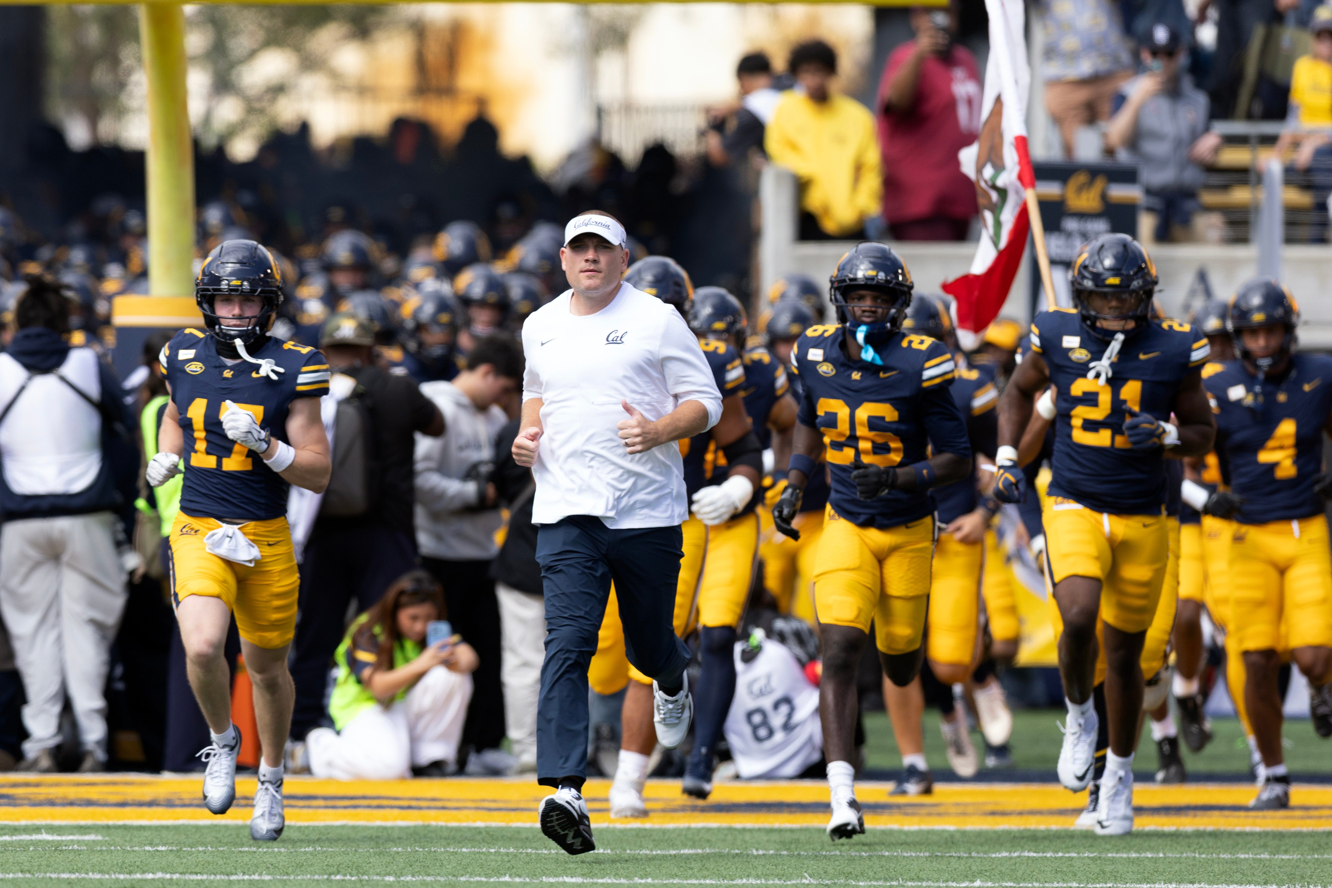 Oct 10, 2026; Berkeley, California, USA;  California Golden Bears head coach Tosh Lupoi enters the field before facing the Virginia Tech Hokies at California Memorial Stadium.  Mandatory Credit: D. Ross Cameron-Imagn Images