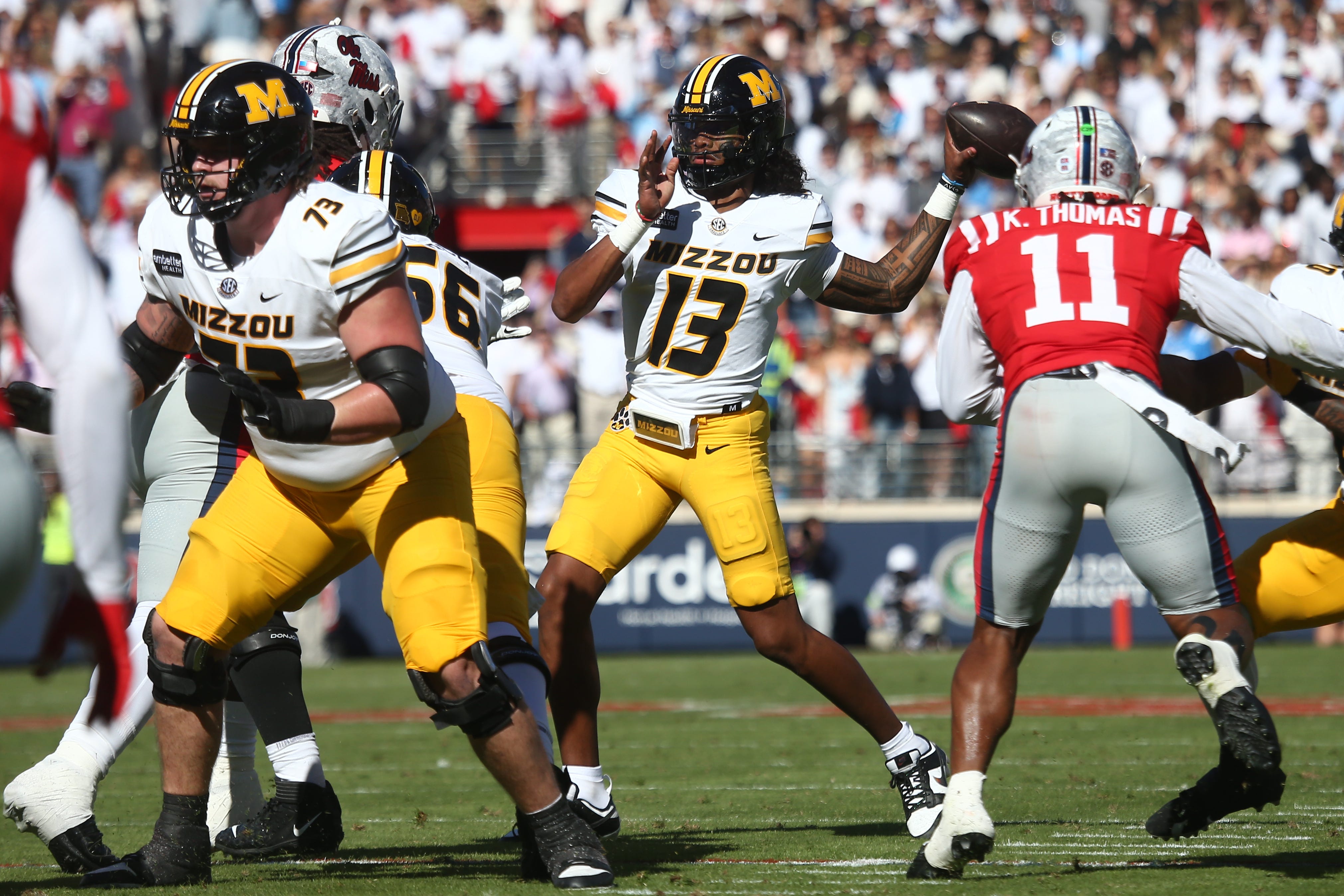 Oct 17, 2026; Oxford, Mississippi, USA;  Missouri Tigers quarterback Austin Simmons (13) throws a pass during the first quarter against the Mississippi Rebels at Vaught-Hemingway Stadium.  Mandatory Credit: Petre Thomas-Imagn Images