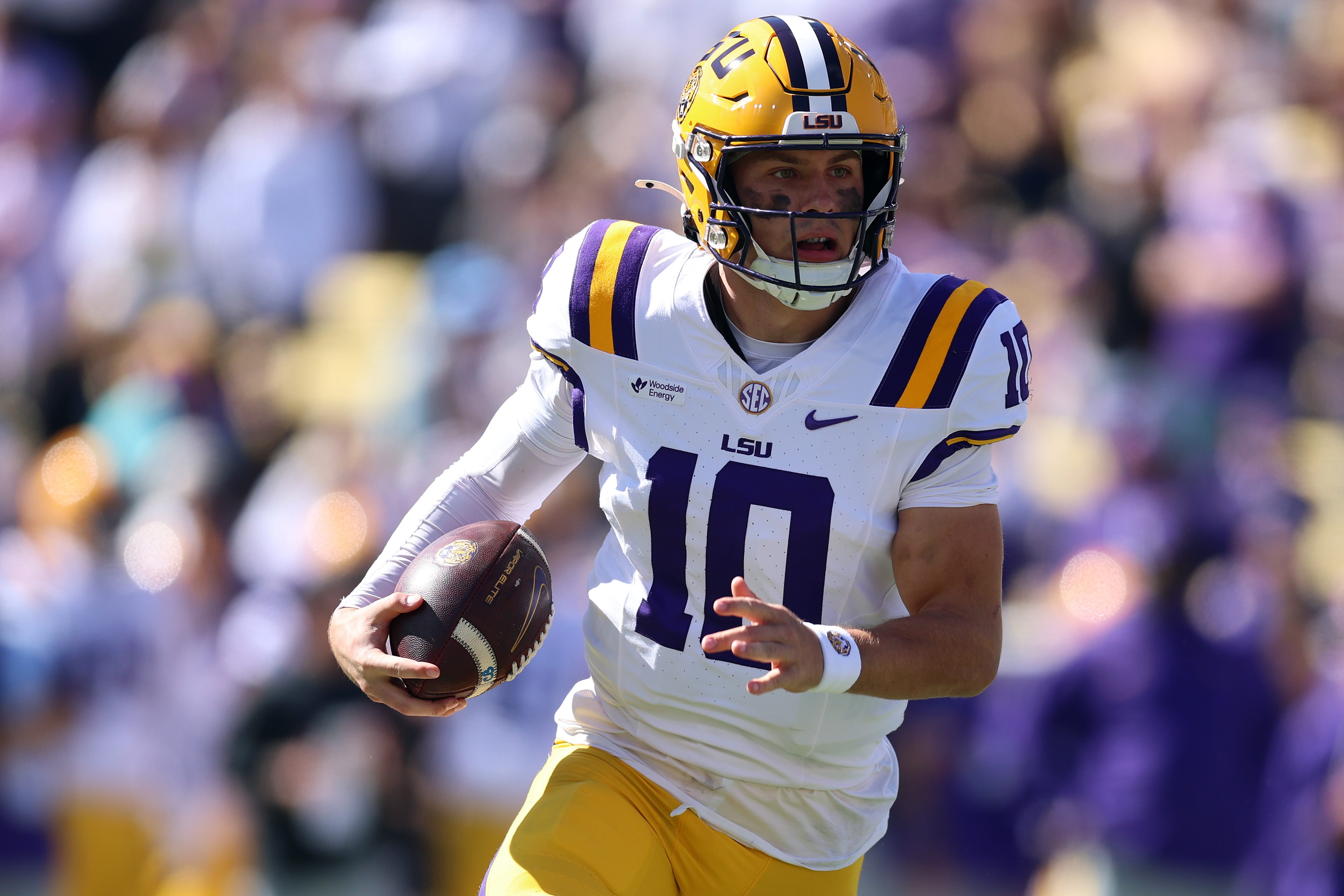 Oct 17, 2026; Baton Rouge, Louisiana, USA;  Louisiana State Tigers quarterback Sam Leavitt (10) runs with the ball during the first half against the Mississippi State Bulldogs at Tiger Stadium.  Mandatory Credit: Stephen Lew-Imagn Images