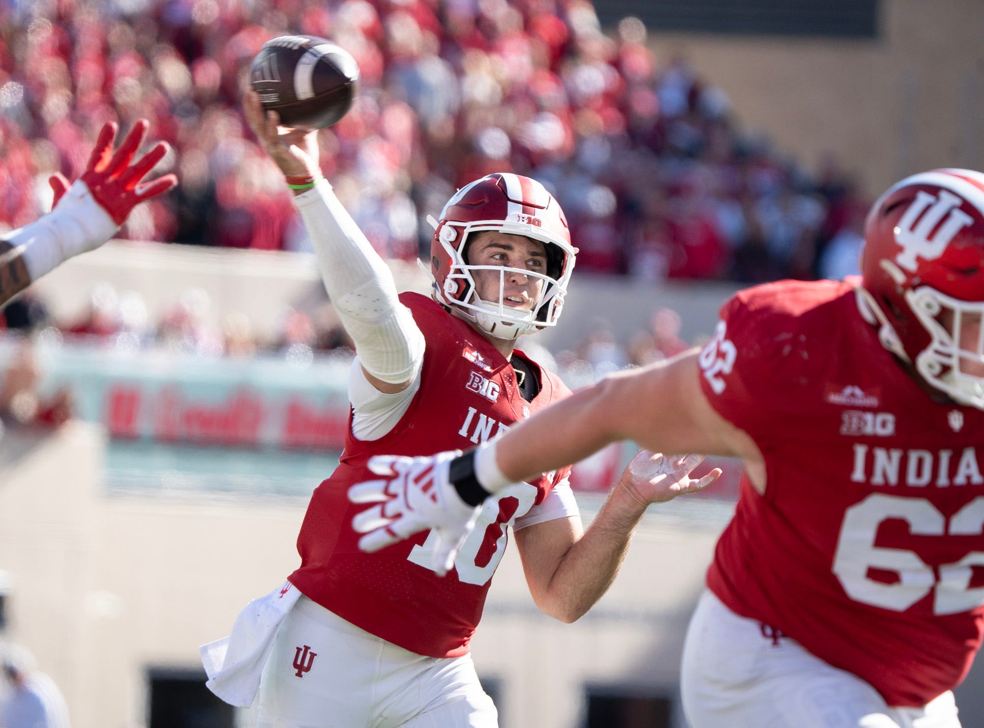 Indiana's Josh Hoover (10) passes for a touchdown to Turbo Richard (1) during the Indiana versus Ohio State football game at Memorial Stadium on Saturday, Oct. 17, 2026.