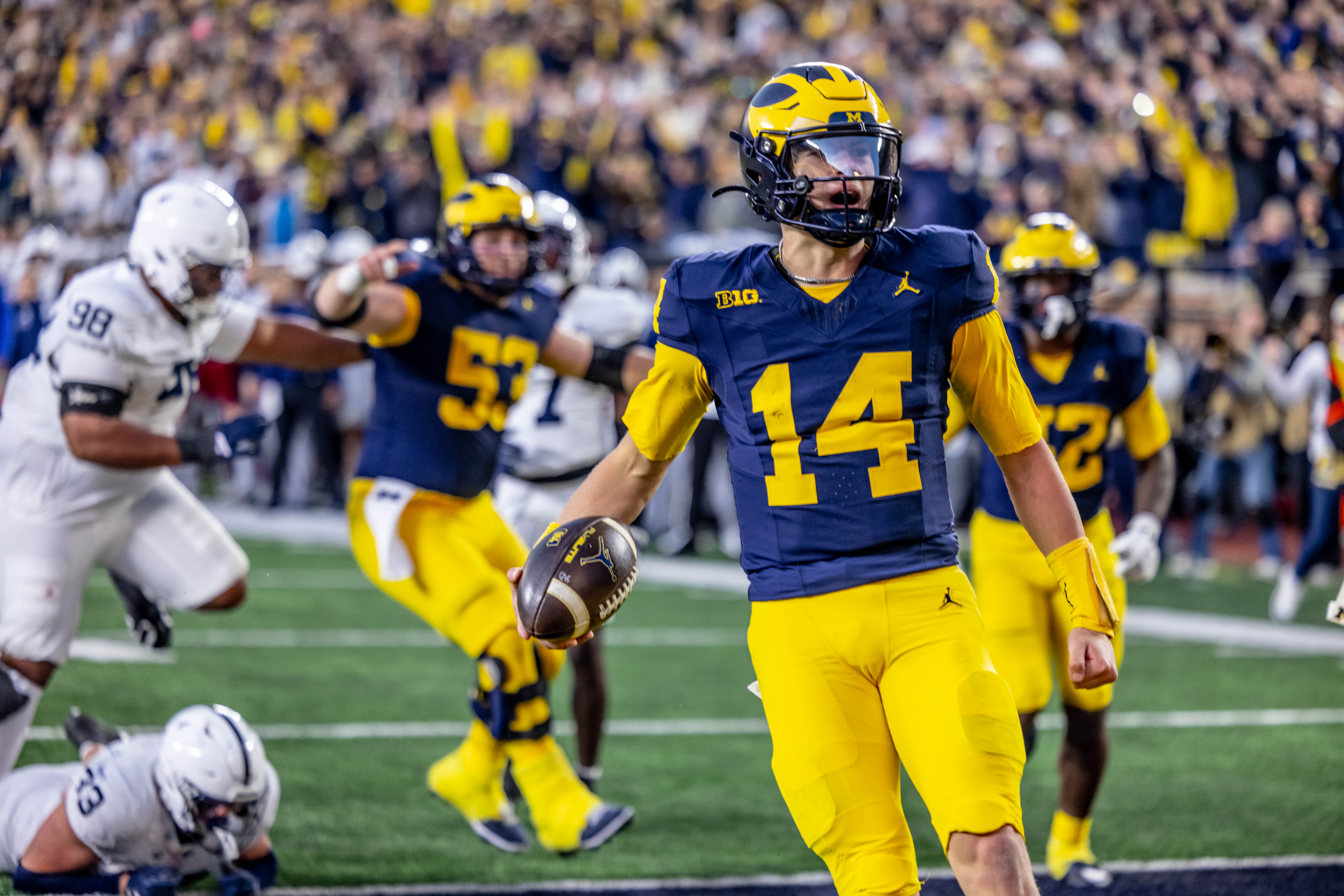 Tommy Carr celebrates his second career TD at Michigan