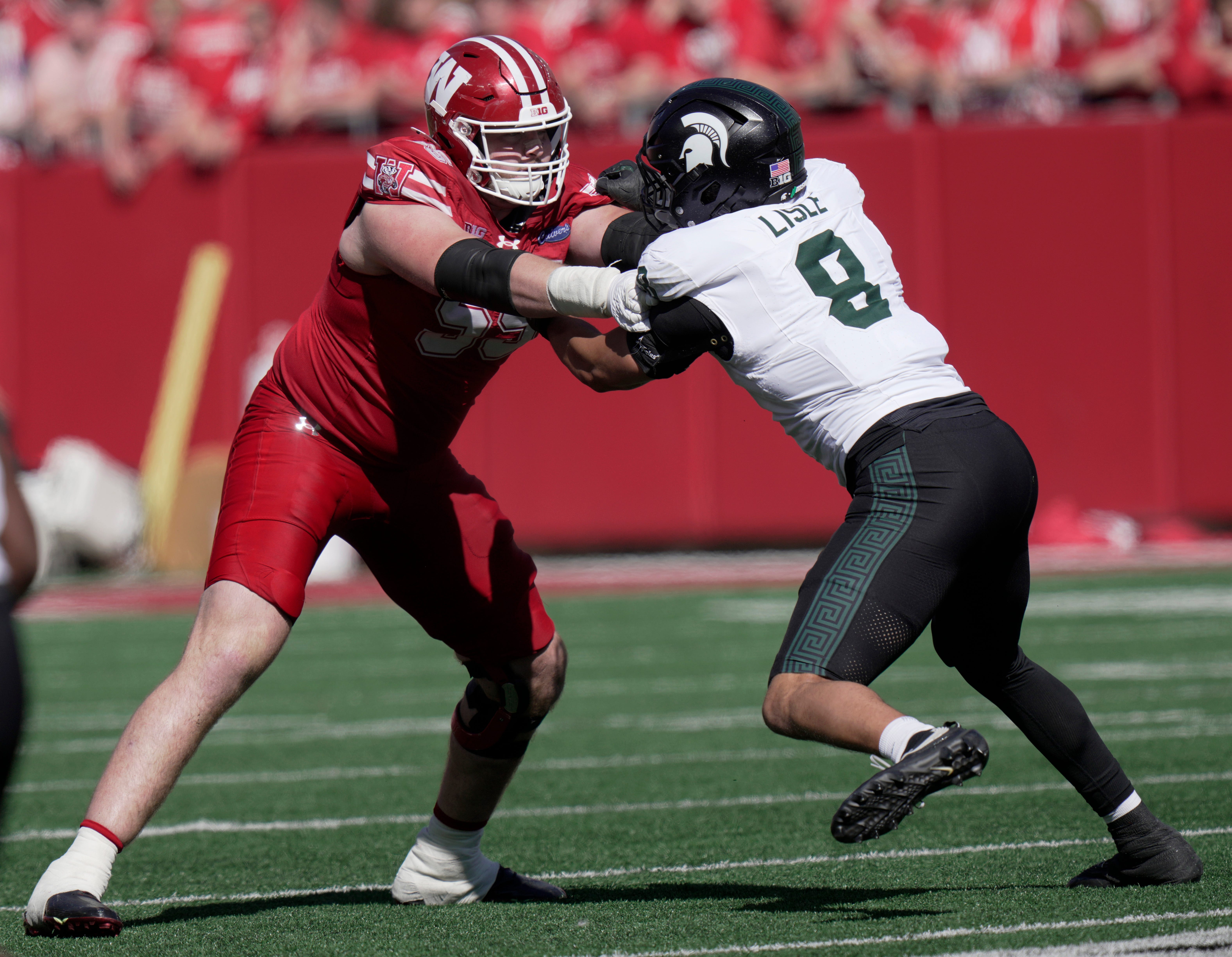 Wisconsin offensive lineman clarifies viral quote after UCLA game - AOL