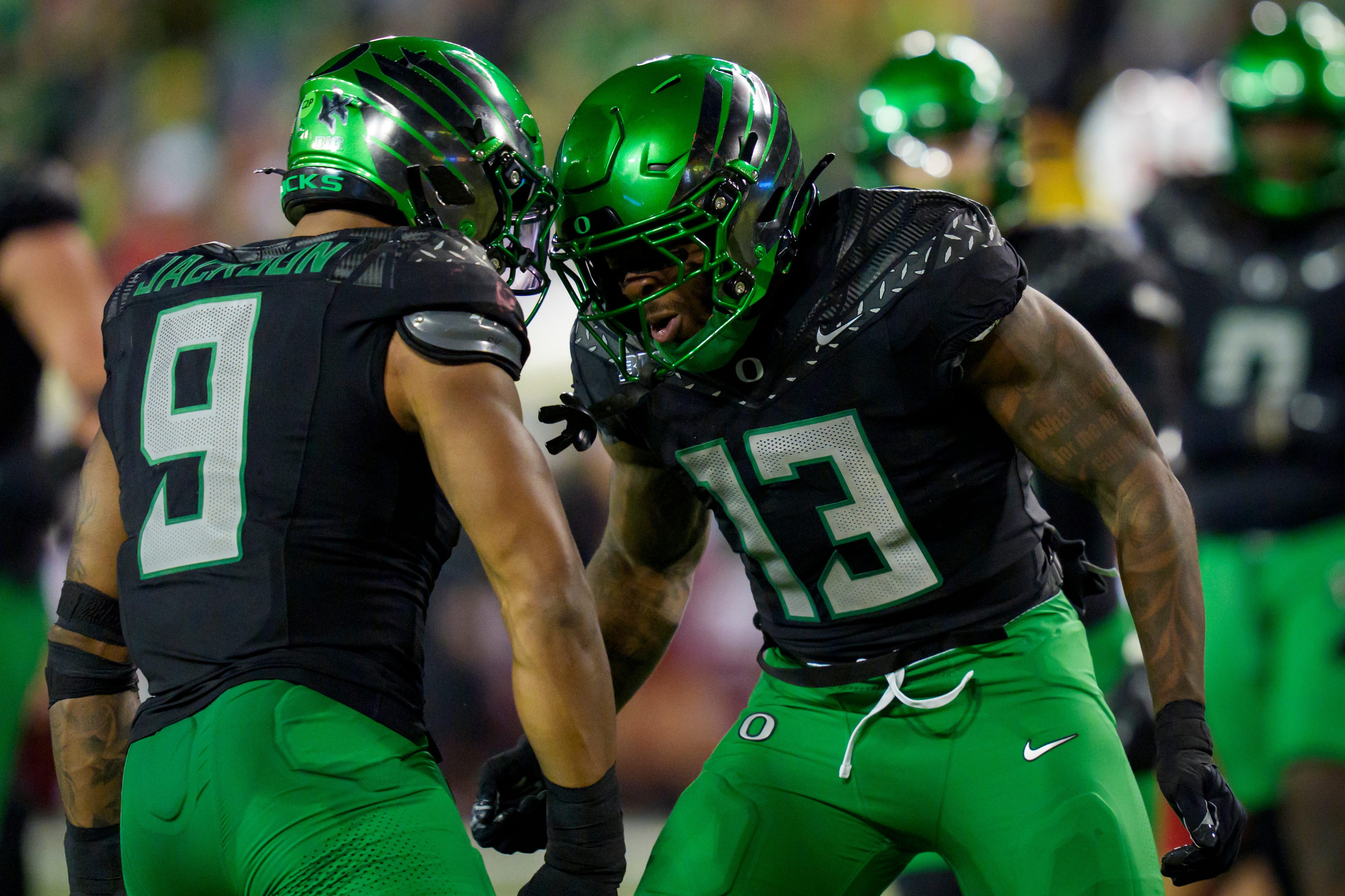 Oregon Ducks inside linebacker Gavin Nix, right, celebrates a stop with Oregon Ducks inside linebacker Devon Jackson as the Oregon Ducks host the Nebraska Cornhuskers on Oct. 17, 2026, at Autzen Stadium in Eugene, Oregon.