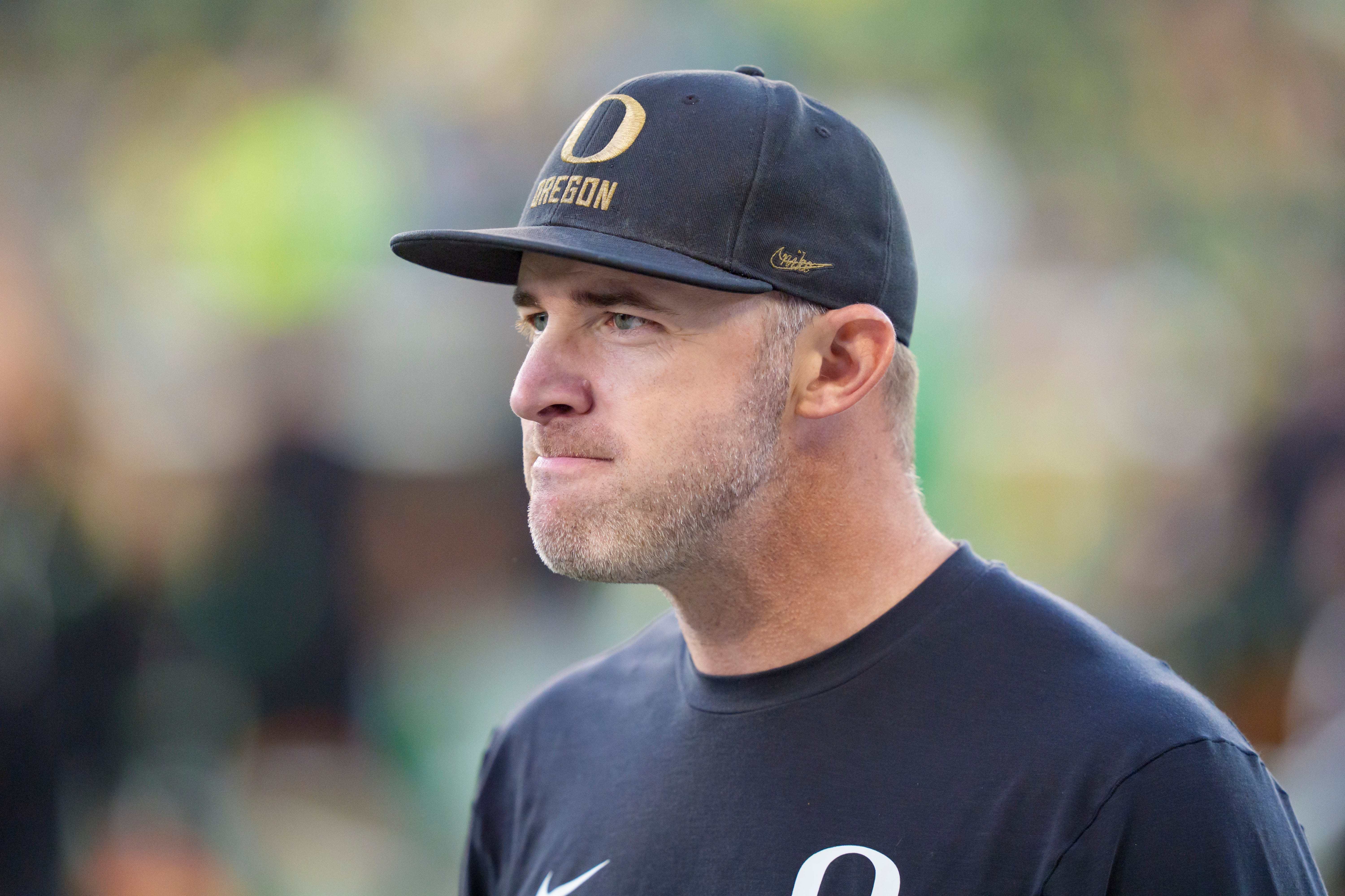 Oregon offensive coordinator Drew Mehringer walks the field before the game as the Oregon Ducks host the Portland State Vikings on Sept. 18, 2026, at Autzen Stadium in Eugene, Oregon.