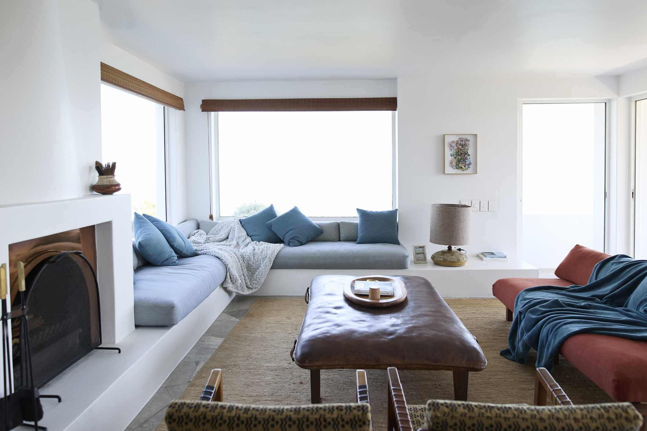 We Asked Designers How to Make a Living Room Inviting Without Just Adding Clutter—6 of Their Top Tips