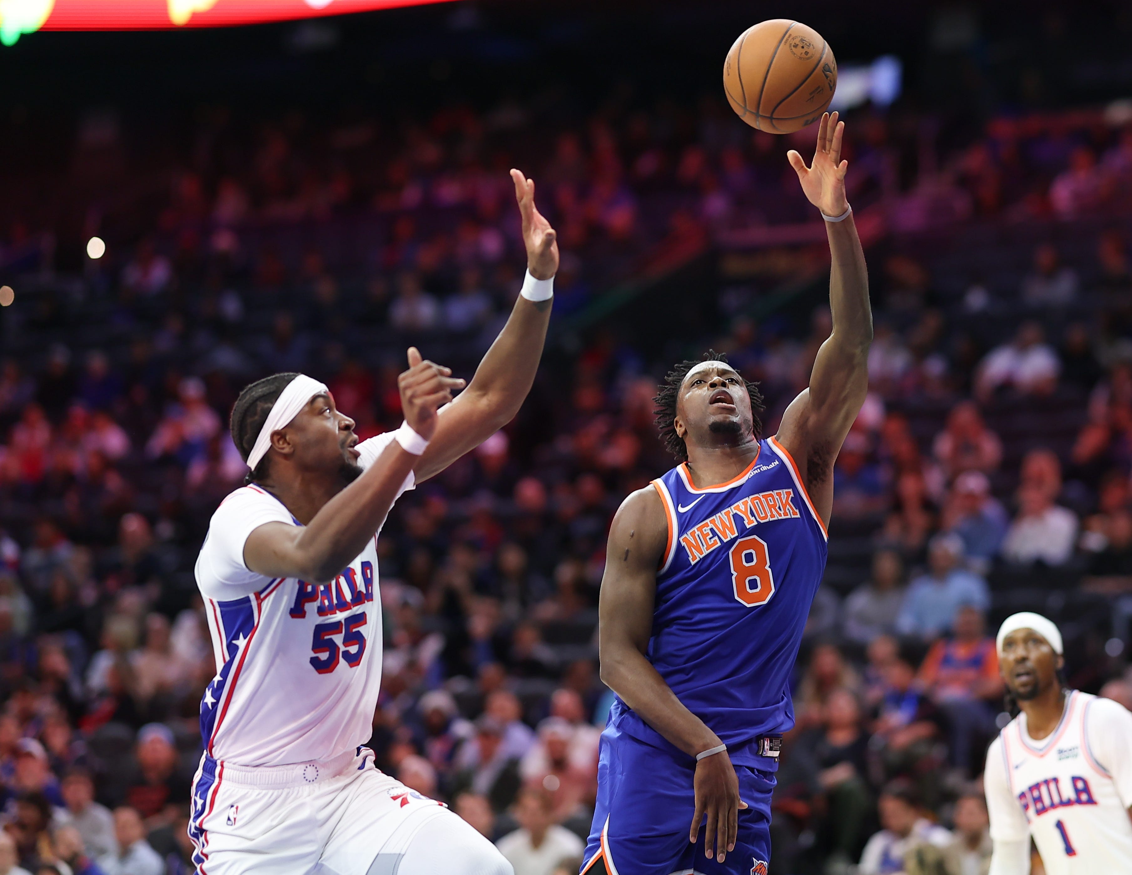 Oct 5, 2026; Philadelphia, Pennsylvania, USA; New York Knicks forward Og Anunoby (8) and Philadelphia 76ers center Ariel Hukporti (55) in action during the first quarter at Xfinity Mobile Arena. Mandatory Credit: Bill Streicher-Imagn Images