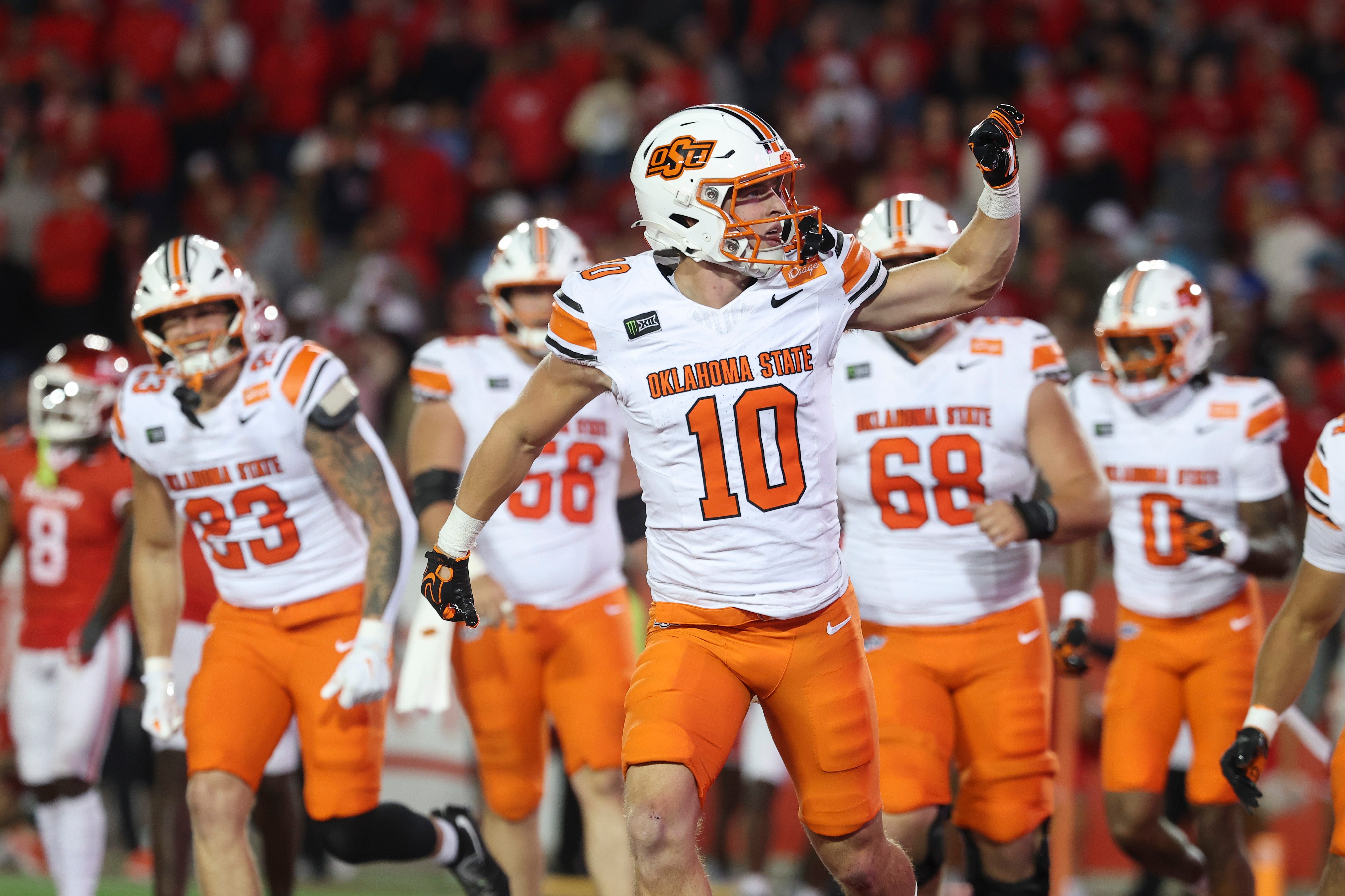 Oct 17, 2026; Houston, Texas, USA; Oklahoma State Cowboys wide receiver Wyatt Young (10) reacts after a touchdown reception during the third quarter against the Houston Cougars at TDECU Stadium. Mandatory Credit: Troy Taormina-Imagn Images