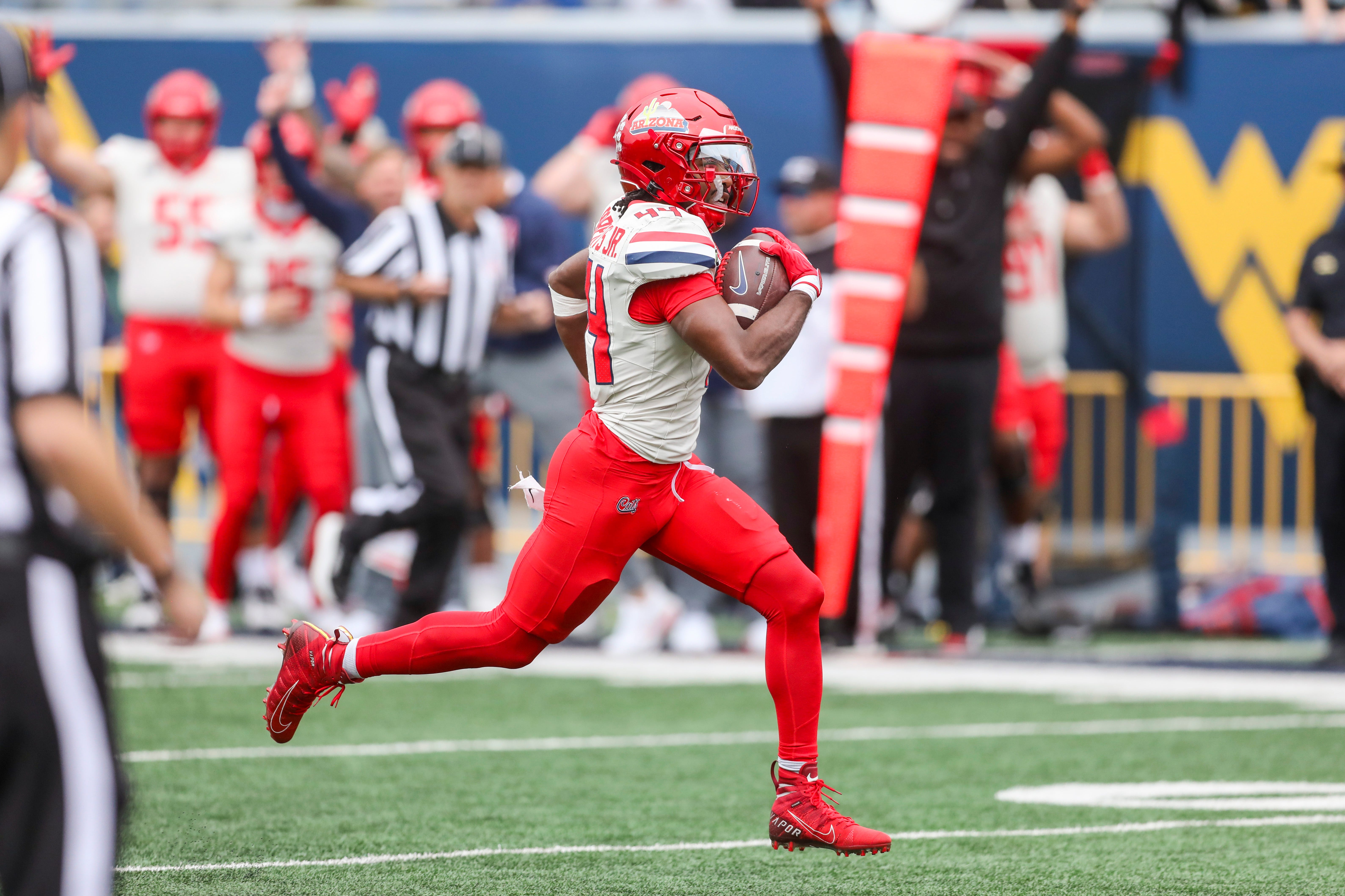 Oct 10, 2026; Morgantown, West Virginia, USA; Arizona Wildcats running back Antwan Roberts (44) scores a touchdown during the fourth quarter against the West Virginia Mountaineers at Milan Puskar Stadium. Mandatory Credit: Ben Queen-Imagn Images