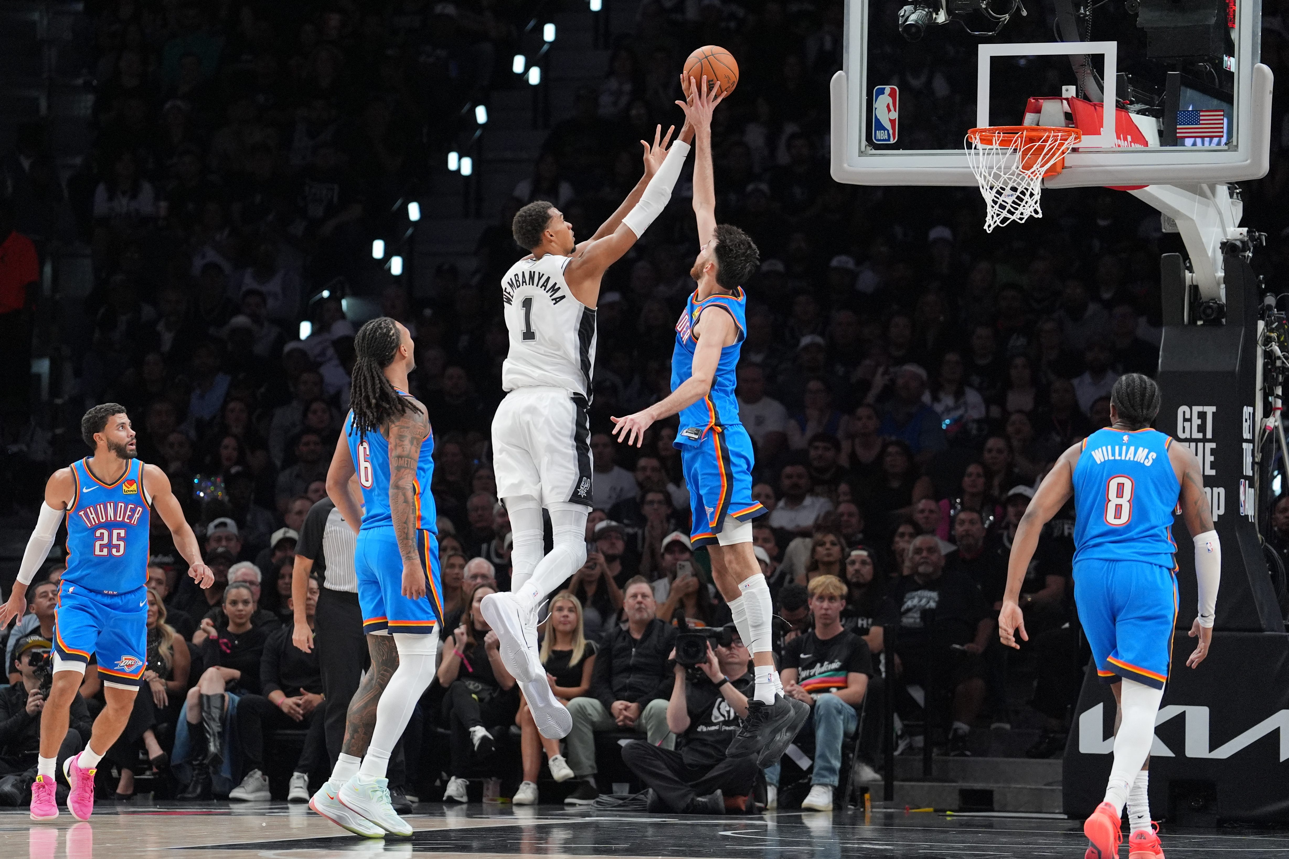 Oct 20, 2026; San Antonio, Texas, USA;  Oklahoma City Thunder center Chet Holmgren (7) blocks a shot by San Antonio Spurs forward Victor Wembanyama (1) in the first half at Frost Bank Center.  Mandatory Credit: Daniel Dunn-Imagn Images