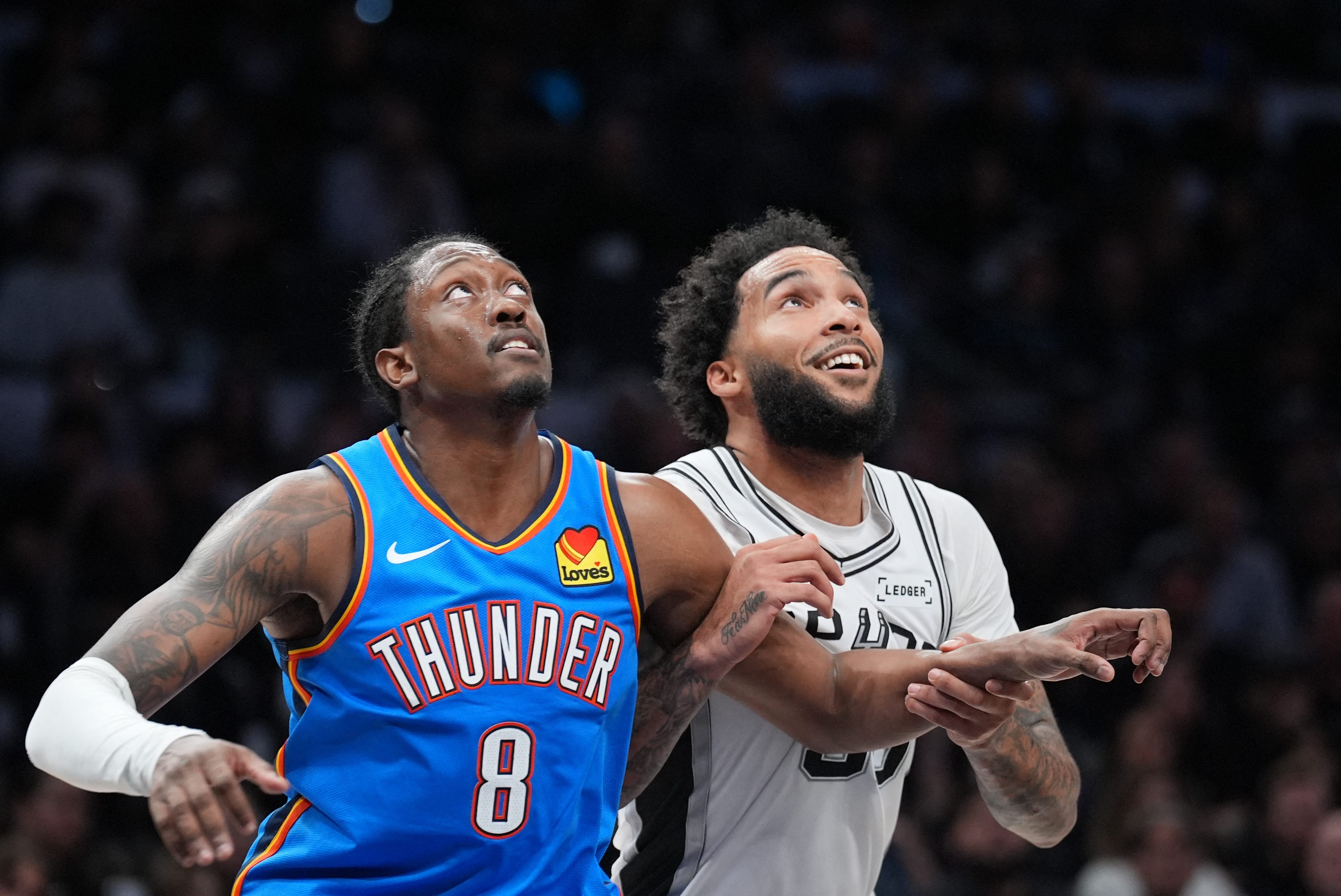 Oct 20, 2026; San Antonio, Texas, USA;  Oklahoma City Thunder guard Jalen Williams (8) and San Antonio Spurs forward Julian Champagnie (30) watch a shot in the second half at Frost Bank Center.  Mandatory Credit: Daniel Dunn-Imagn Images