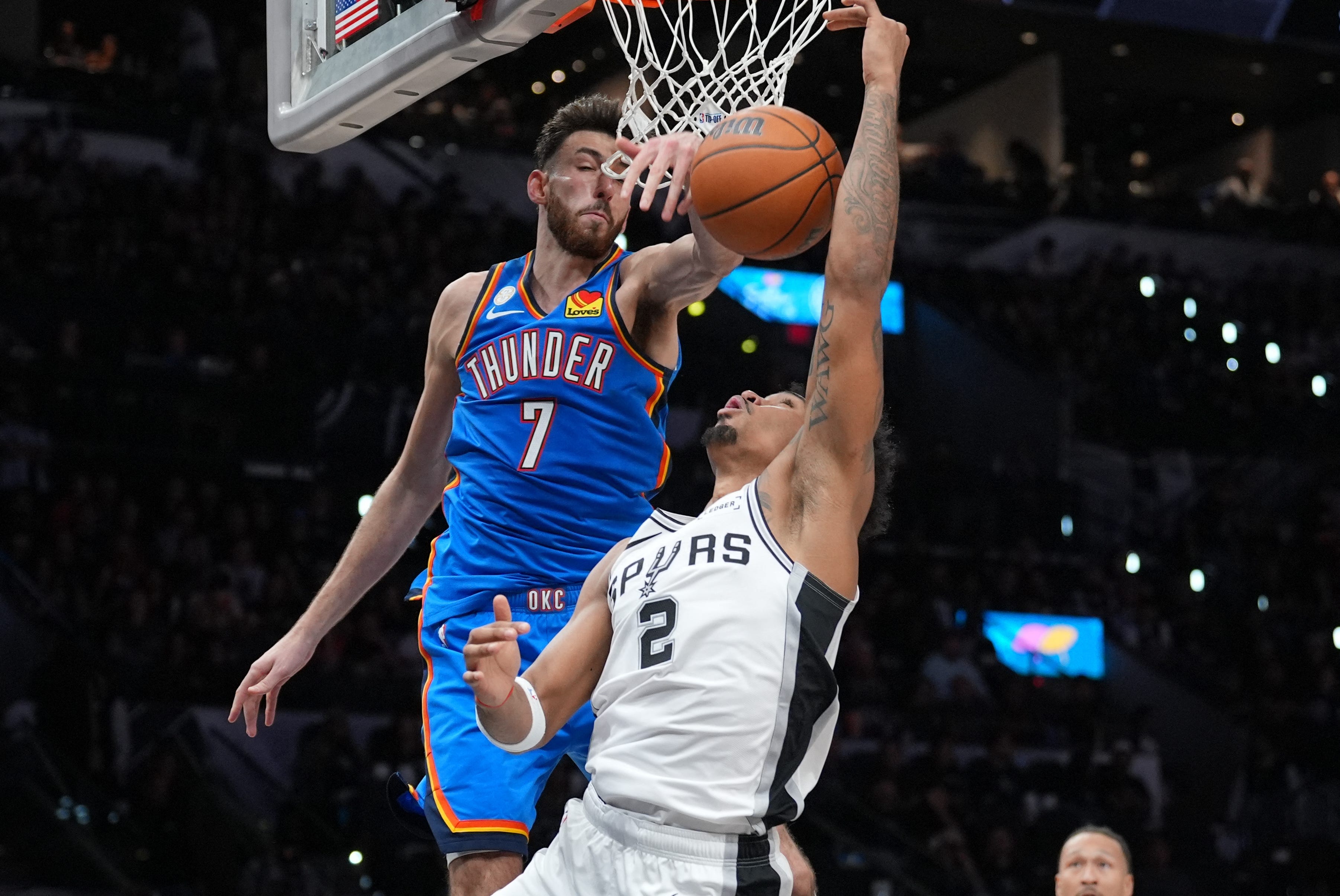 Oct 20, 2026; San Antonio, Texas, USA;  Oklahoma City Thunder center Chet Holmgren (7) blocks a shot by San Antonio Spurs guard Dylan Harper (2) in the second half at Frost Bank Center.  Mandatory Credit: Daniel Dunn-Imagn Images