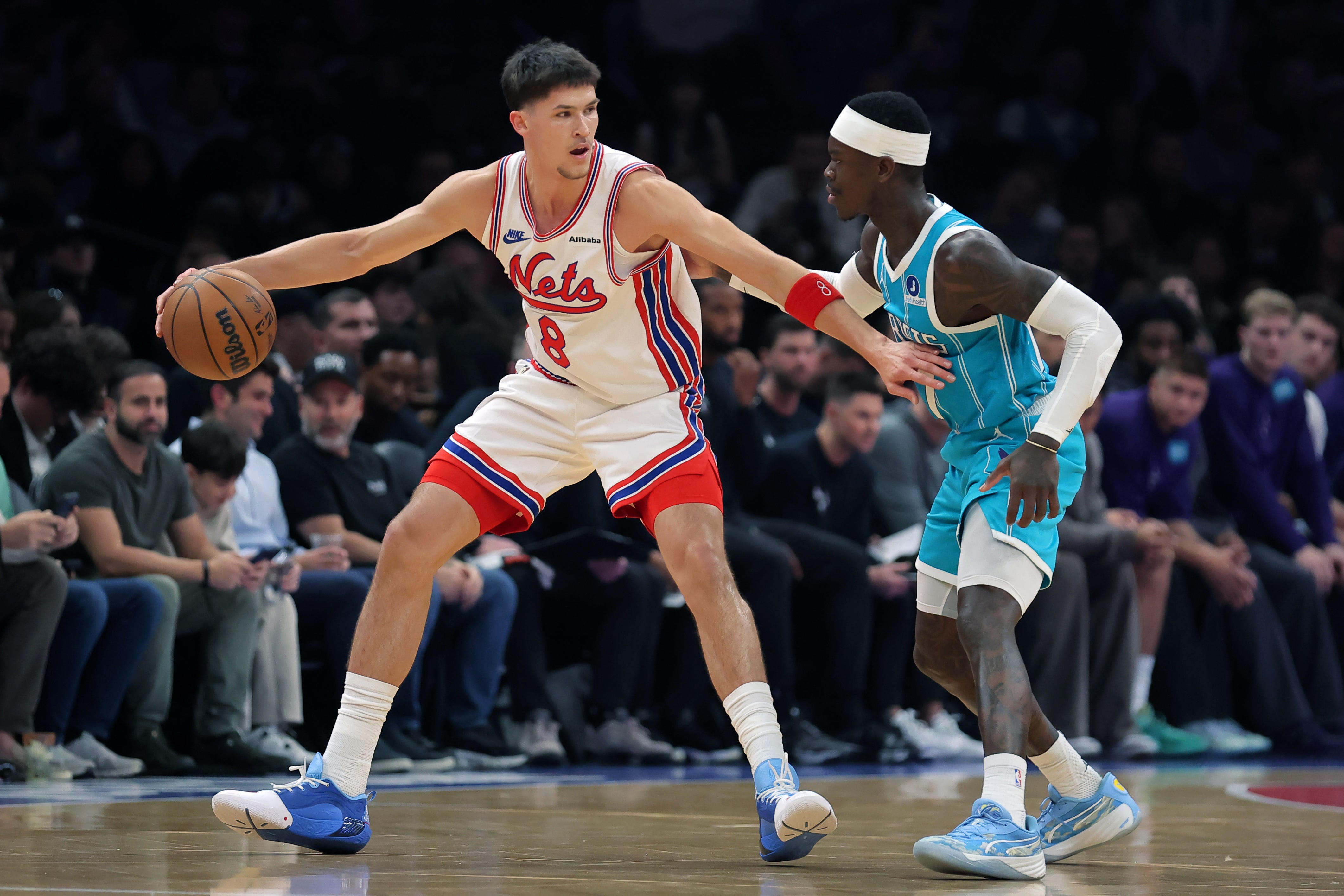 Oct 21, 2026; Brooklyn, New York, USA; Brooklyn Nets guard Egor Demin (8) controls the ball against Charlotte Hornets guard Dennis Schroder (17) during the first quarter at Barclays Center. Mandatory Credit: Brad Penner-Imagn Images