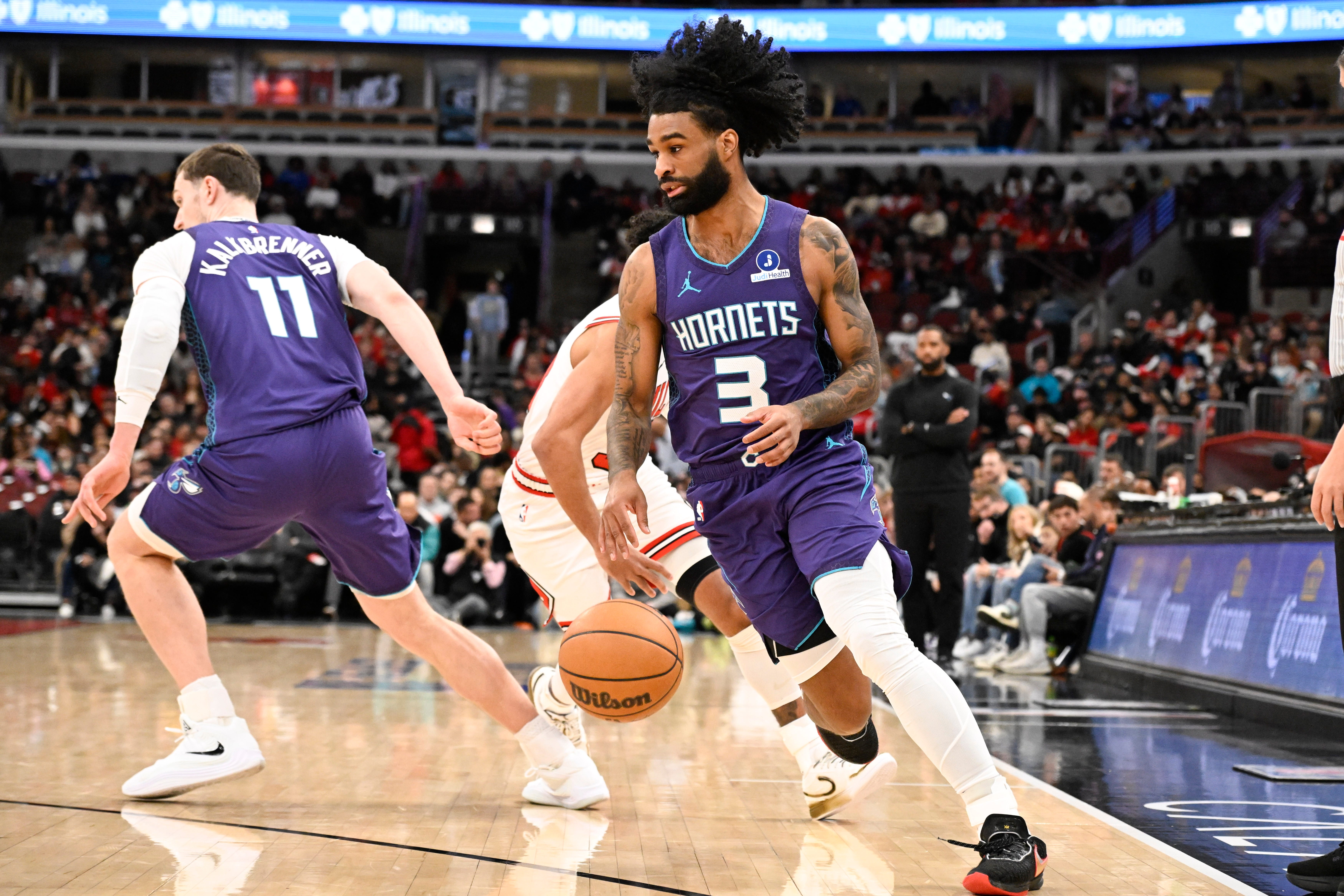 Feb 24, 2026; Chicago, Illinois, USA; Charlotte Hornets guard Coby White (3) moves the ball against the Chicago Bulls during the first half at United Center. Mandatory Credit: Matt Marton-Imagn Images