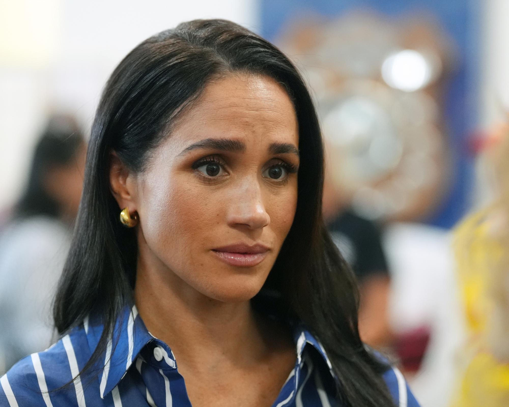 Duchess of Sussex ‘deeply distressed' over child sexual abuse image claims against father