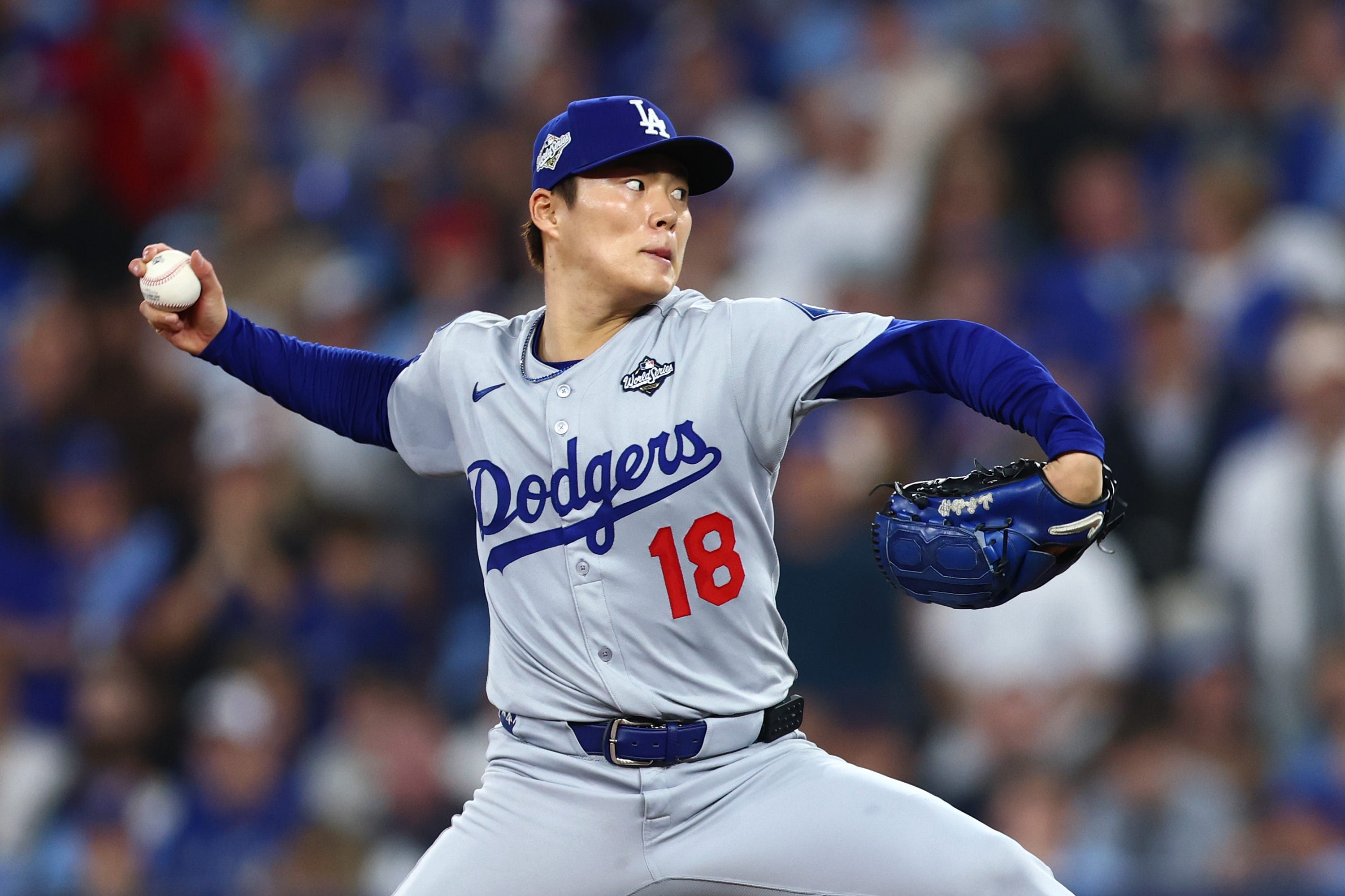 Yoshinobu Yamamoto #18 of the Los Angeles Dodgers pitches against the Toronto Blue Jays during the fifth inning in game two of the 2025 World Series at Rogers Center on October 25, 2025 in Toronto, Ontario.
