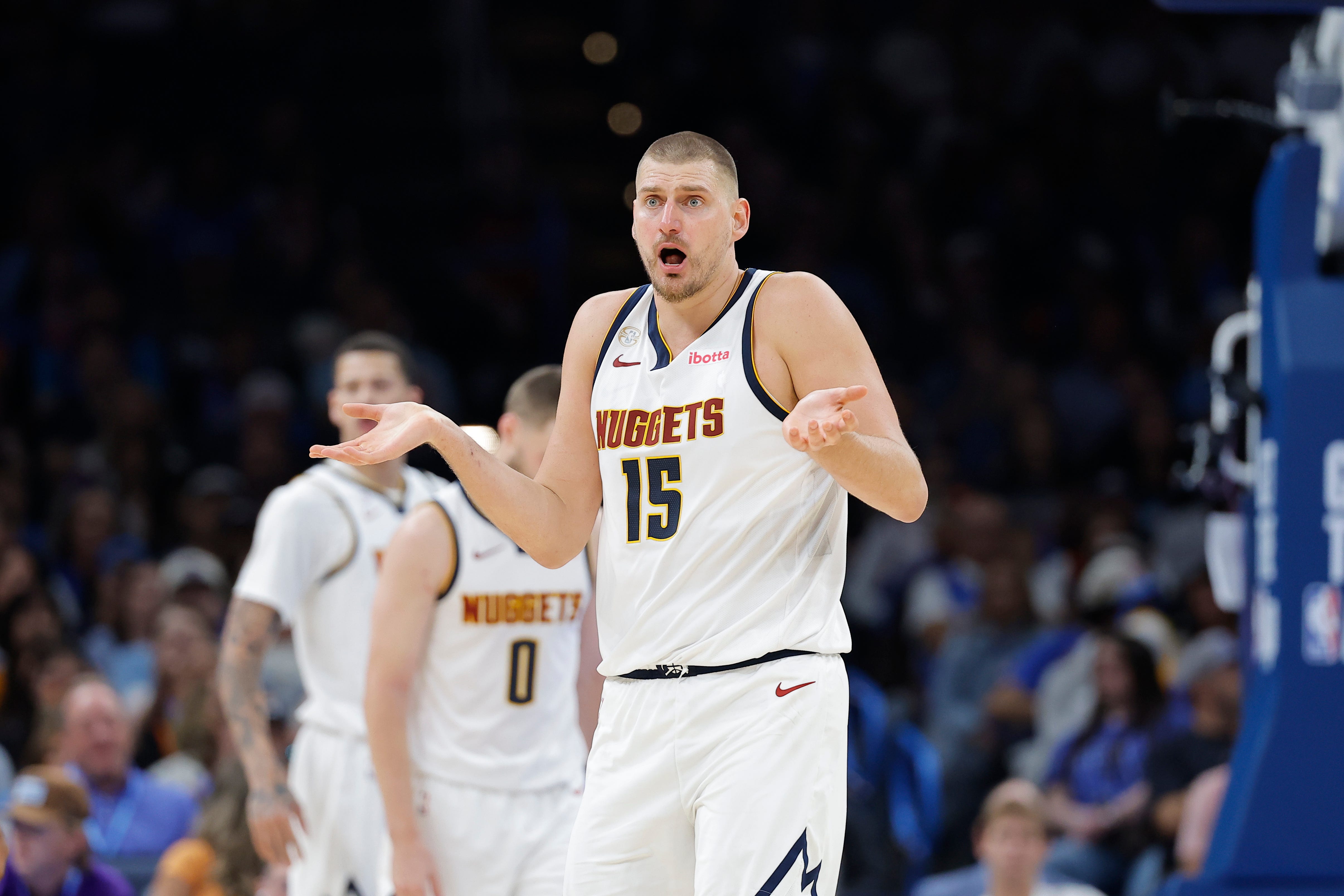 Oct 22, 2026; Oklahoma City, Oklahoma, USA; Denver Nuggets center Nikola Jokic (15) reacts after a play against the Oklahoma City Thunder during the second half at Paycom Center. Mandatory Credit: Alonzo Adams-Imagn Images