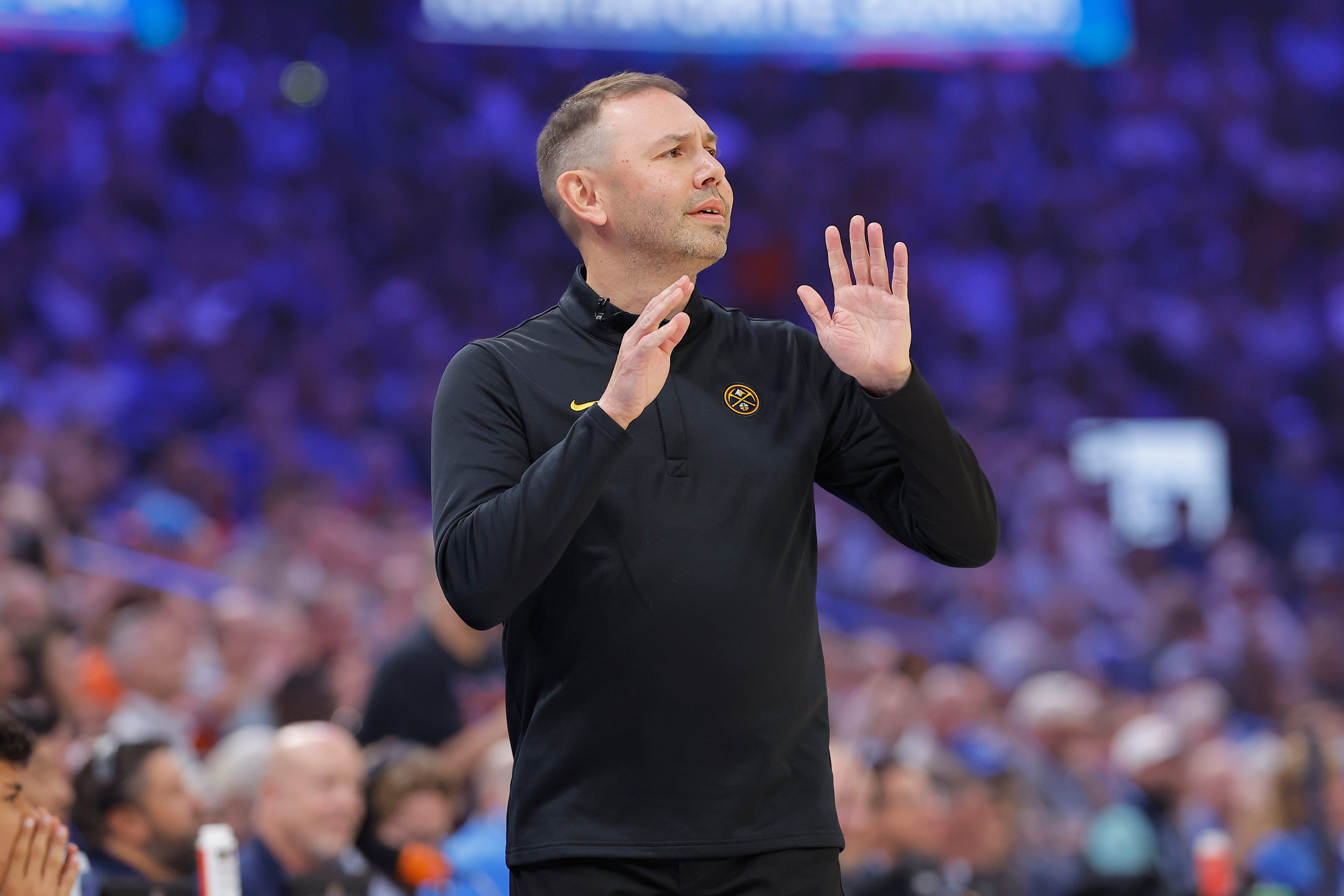 Oct 22, 2026; Oklahoma City, Oklahoma, USA; Denver Nuggets head coach David Adelman watches his team play against the Oklahoma City Thunder during the first quarter at Paycom Center. Mandatory Credit: Alonzo Adams-Imagn Images