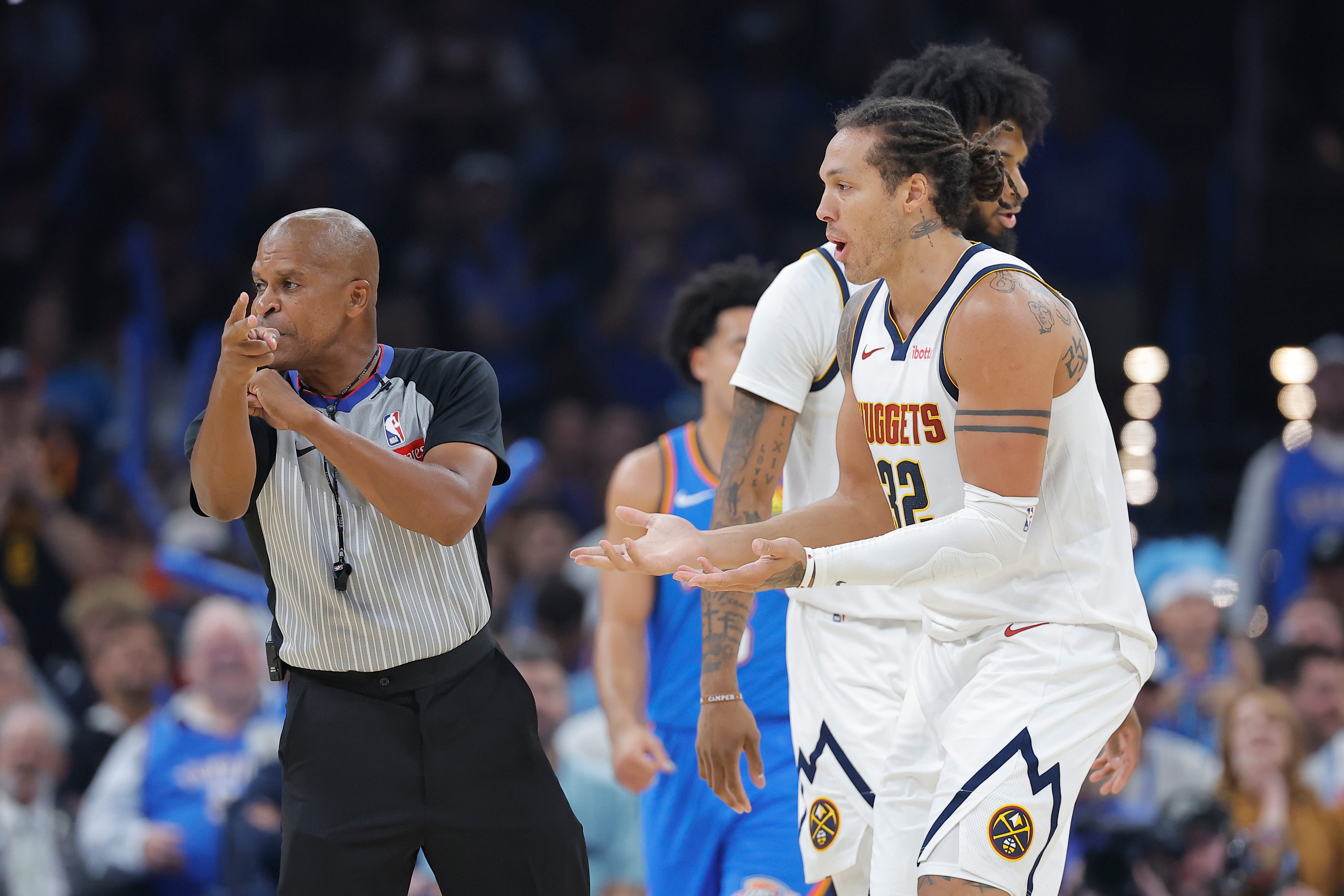 Oct 22, 2026; Oklahoma City, Oklahoma, USA; Denver Nuggets forward Aaron Gordon (32) reacts after a foul is called against him during the first half against the Oklahoma City Thunder at Paycom Center. Mandatory Credit: Alonzo Adams-Imagn Images