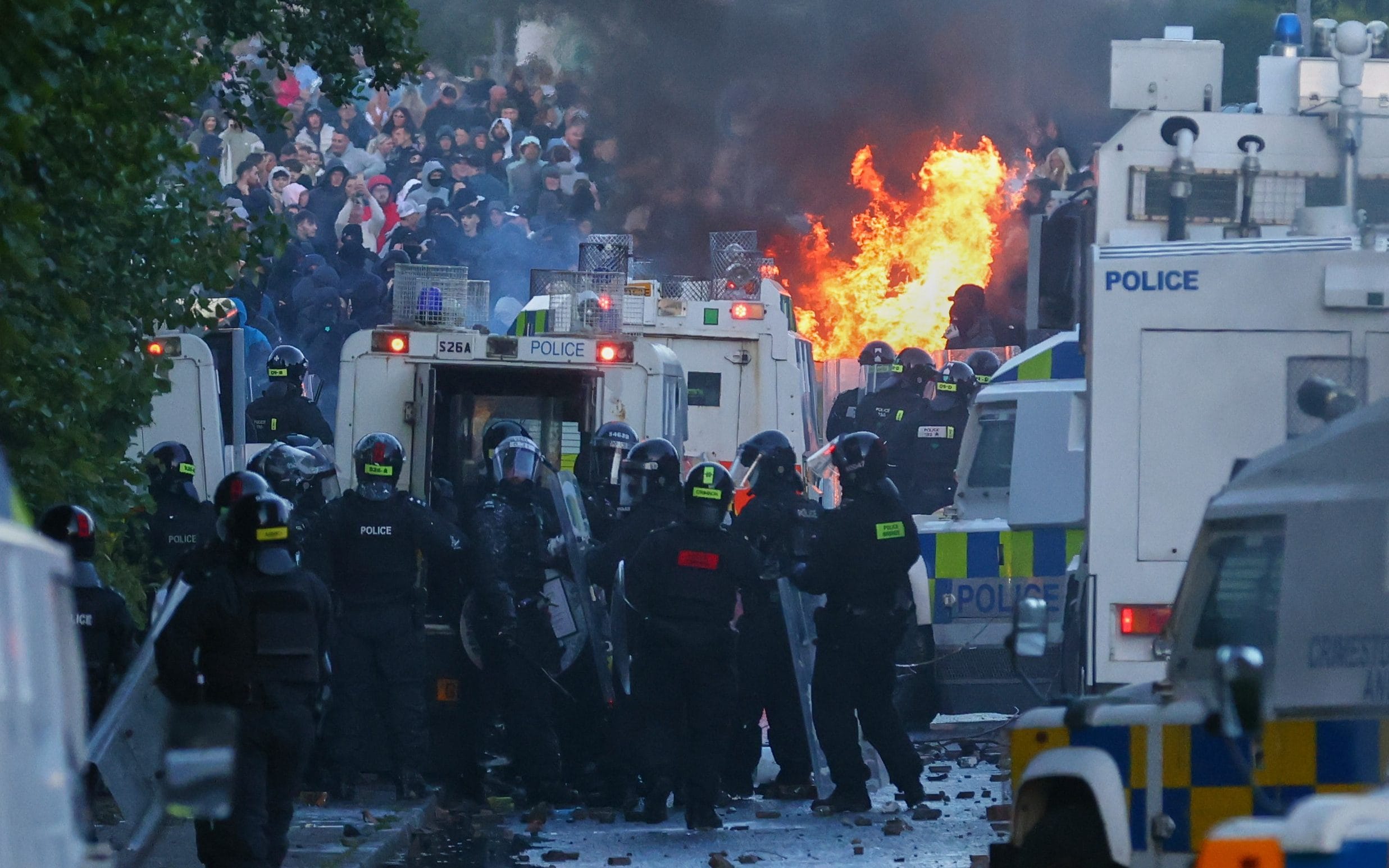 Migrant Bus Migrant Belfast stabbing suspect pleads not guilty - AOL
