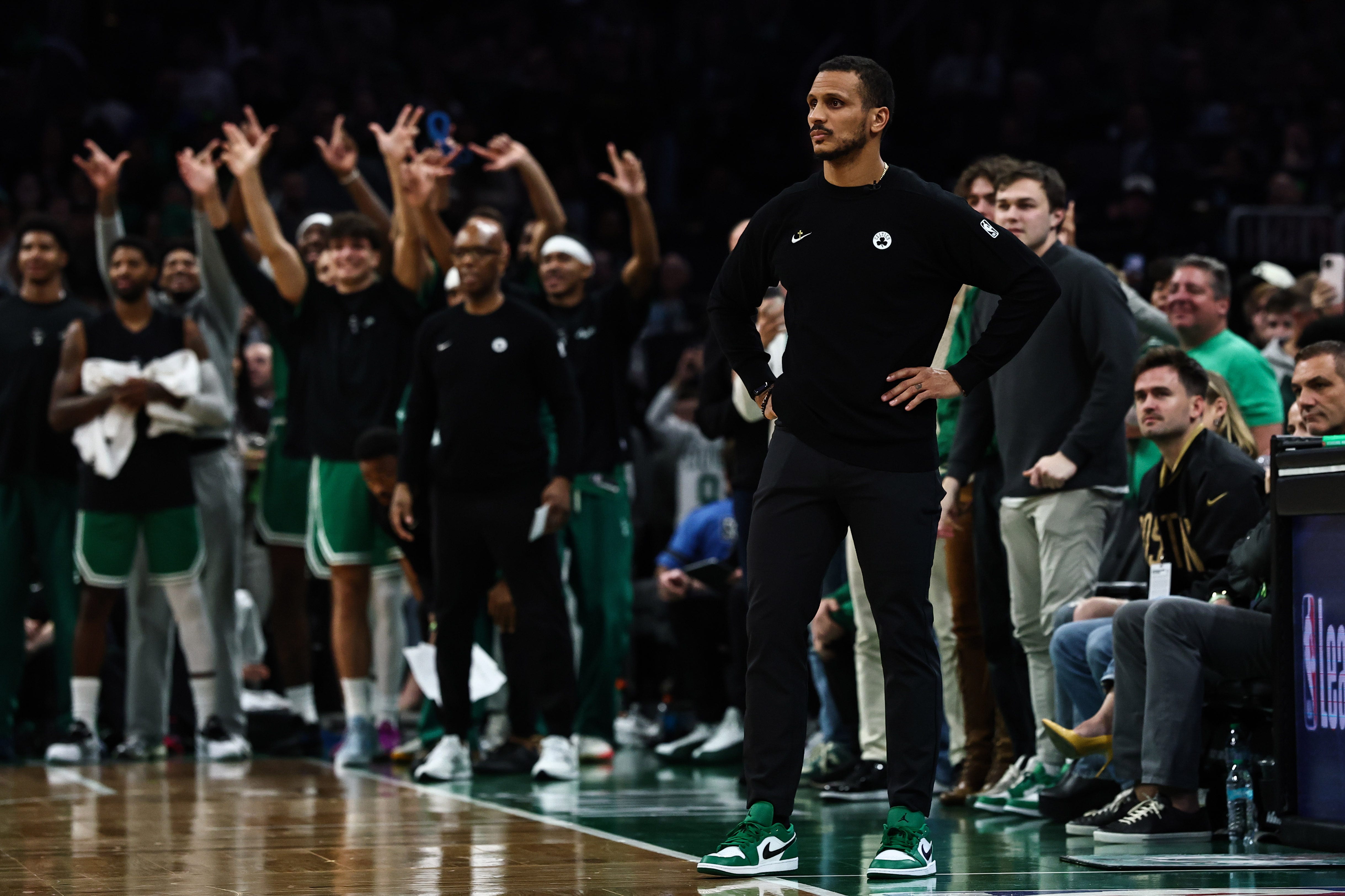 Oct 23, 2026; Boston, Massachusetts, USA; As the bench celebrates, Boston Celtics head coach Joe Mazzulla watches the play during the second half against the New York Knicks at TD Garden. Mandatory Credit: Winslow Townson-Imagn Images