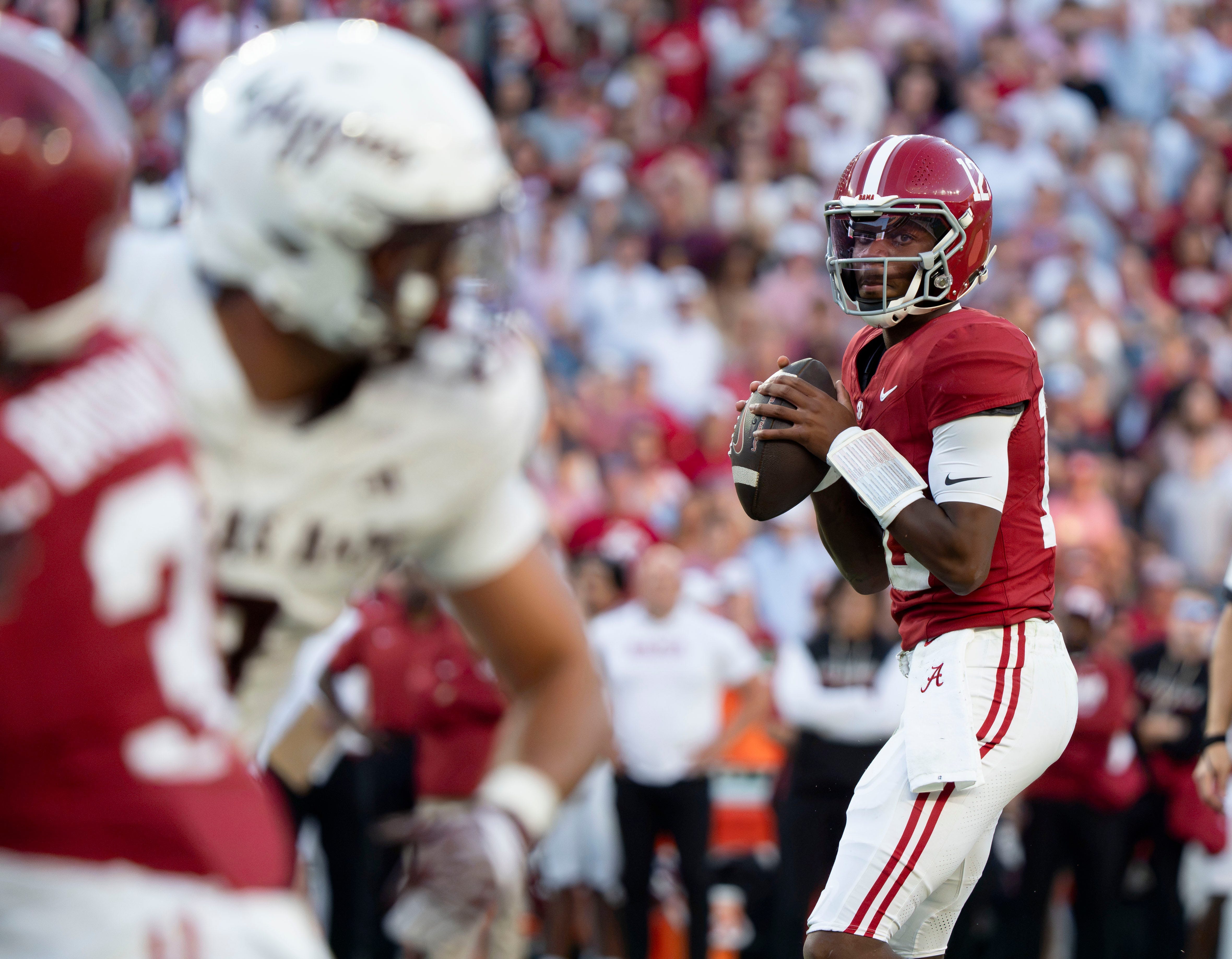 Oct 24, 2026; Tuscaloosa, AL, USA;  Alabama quarterback Keelon Russell (12) throws for a touchdown against Texas A&amp;M at Saban Field at Bryant Denny Stadium. Alabama defeated Texas A&amp;M 31-20. Mandatory Credit: Gary Cosby Jr.-Tuscaloosa News