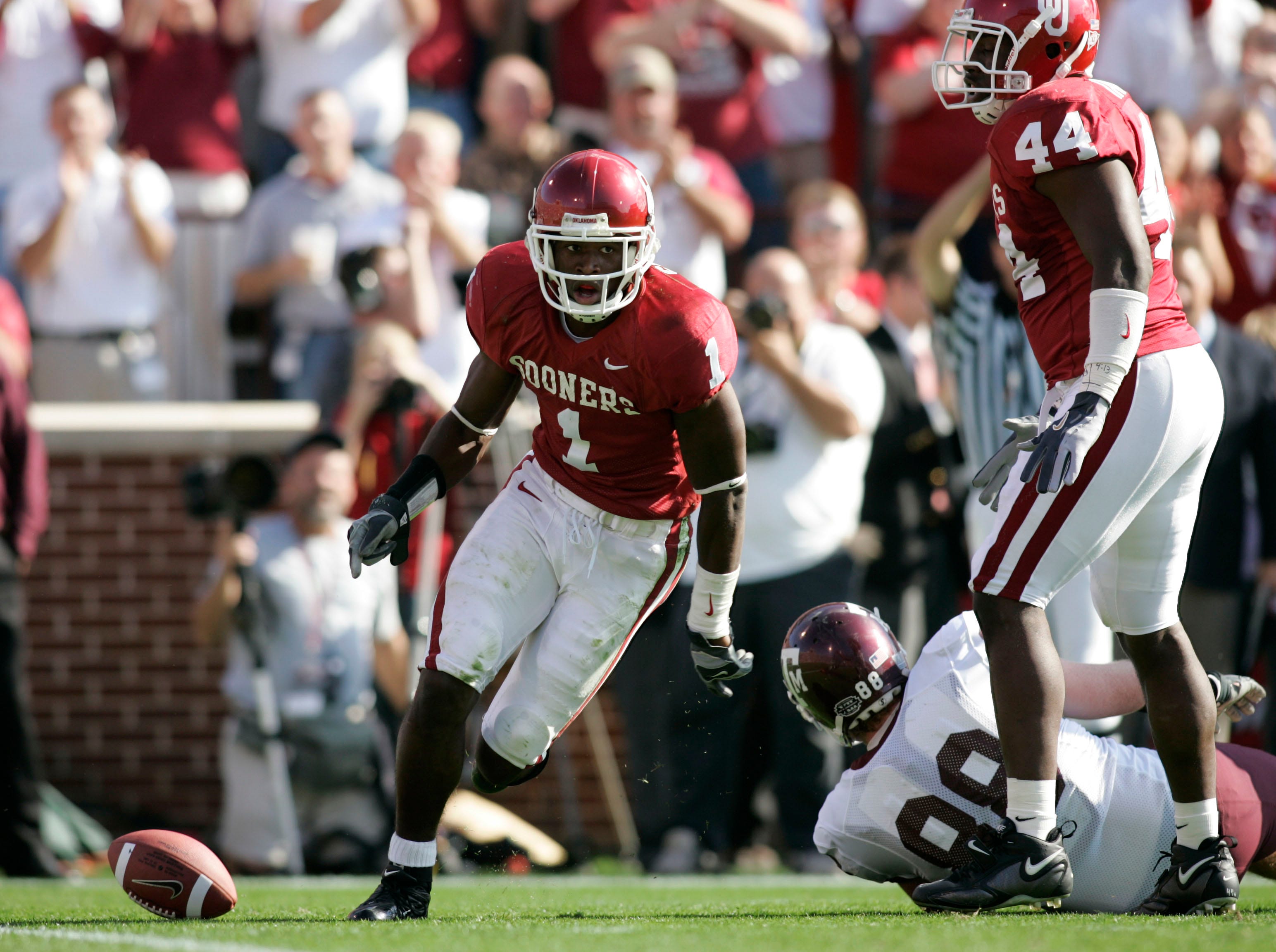 Nov 11, 2005; Norman, OK USA; Oklahoma Sooners safety (1) Reggie Smith reacts after making a play the during the 1st quarter against the Texas A&M Aggies at Oklahoma Memorial Stadium. Tim Heitman-USA TODAY Sports Copyright (c) 2005 Tim Heitman