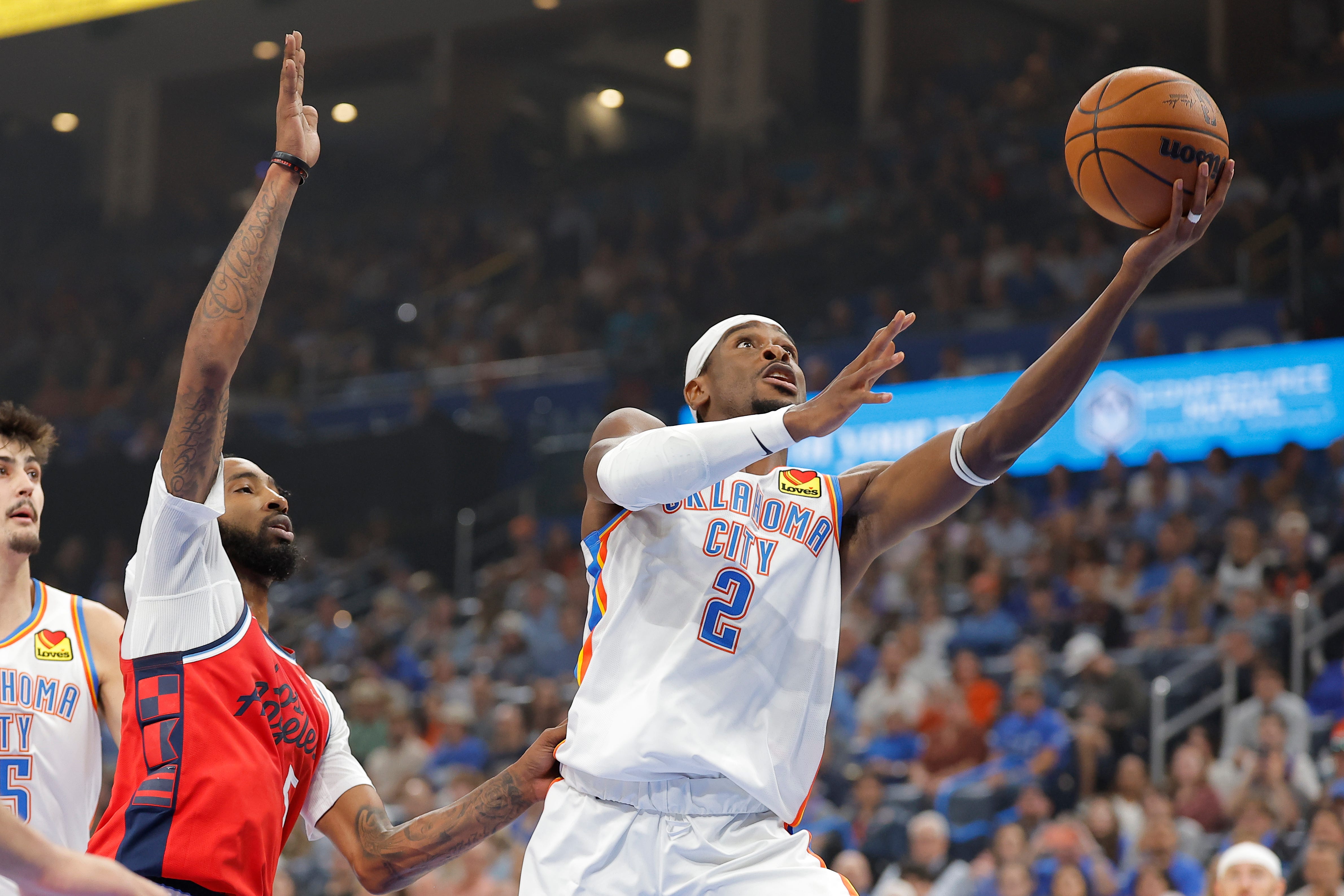 Oct 25, 2026; Oklahoma City, Oklahoma, USA; Oklahoma City Thunder guard Shai Gilgeous-Alexander (2) shoots against the Los Angeles Clippers during the first half at Paycom Center. Mandatory Credit: Alonzo Adams-Imagn Images