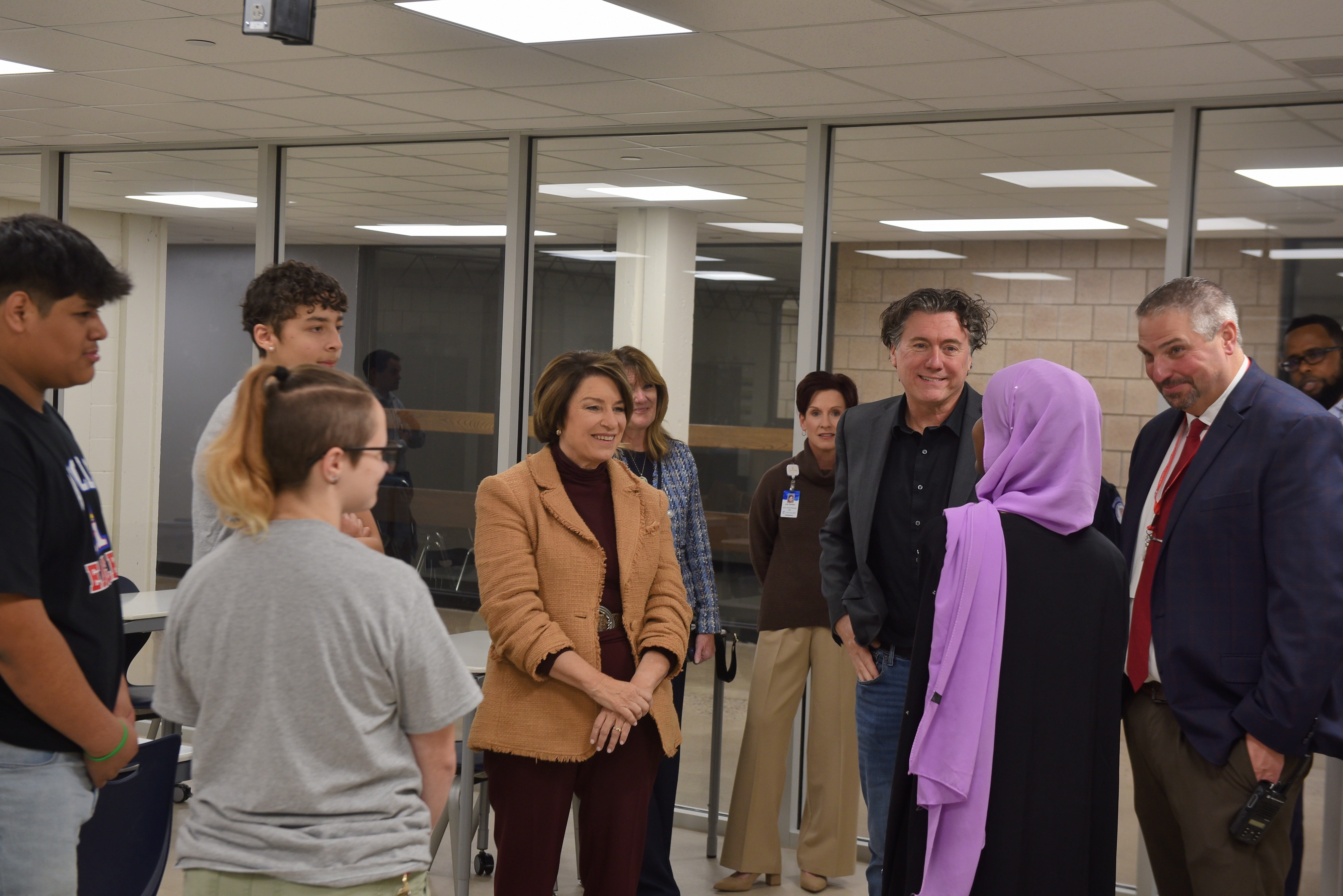 Tour Guide Raining Klobuchar tours Apollo High School's new EMT training facility - AOL