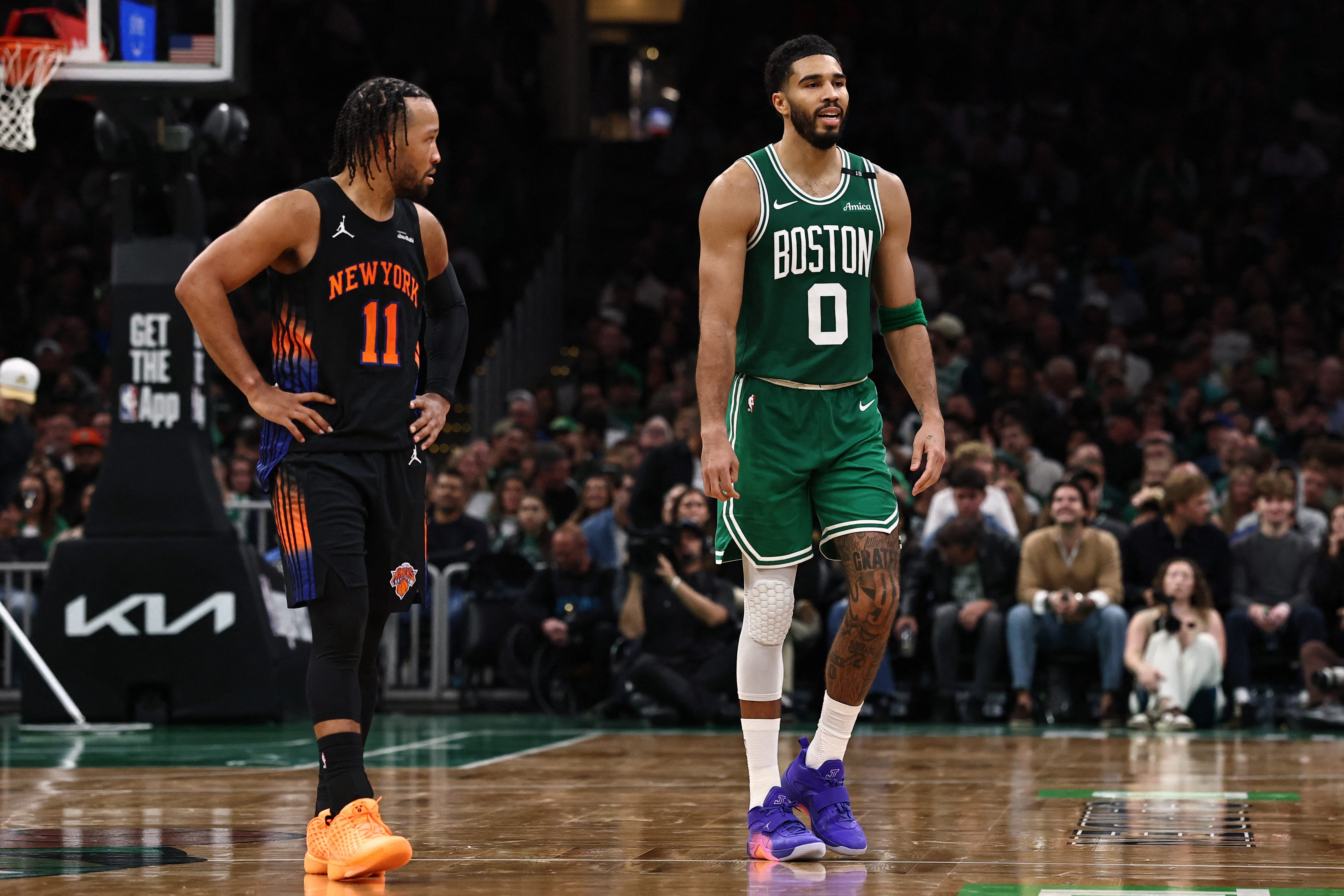 Oct 23, 2026; Boston, Massachusetts, USA; New York Knicks guard Jalen Brunson (11) looks at Boston Celtics forward Jayson Tatum (0) as he walks up the court during the second half at TD Garden. Mandatory Credit: Winslow Townson-Imagn Images