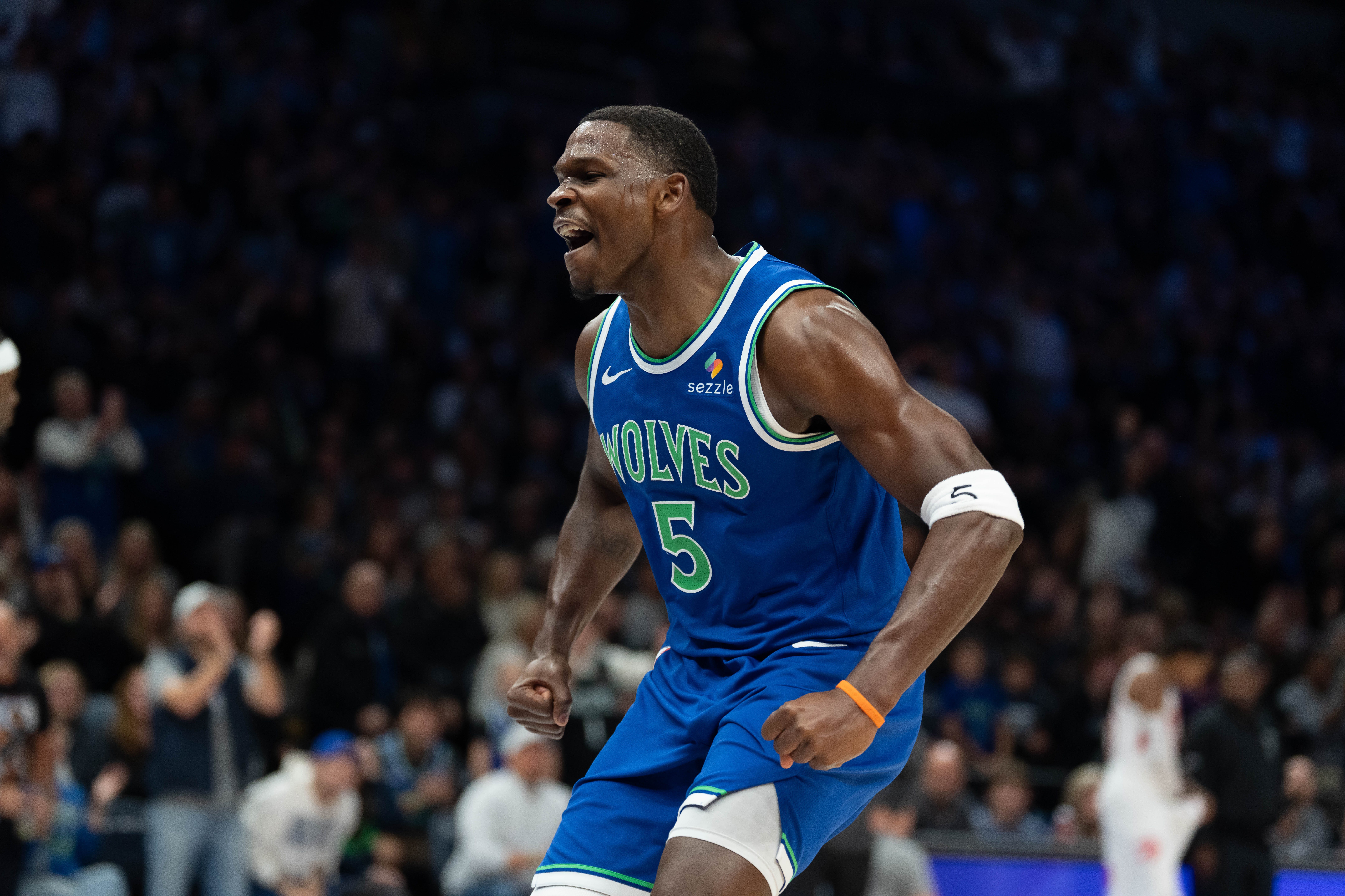 Oct 25, 2026; Minneapolis, Minnesota, USA;  Minnesota Timberwolves guard Anthony Edwards (5) celebrates making a shot against the Toronto Raptors in the first half at Target Center.  Mandatory Credit: Jesse Johnson-Imagn Images