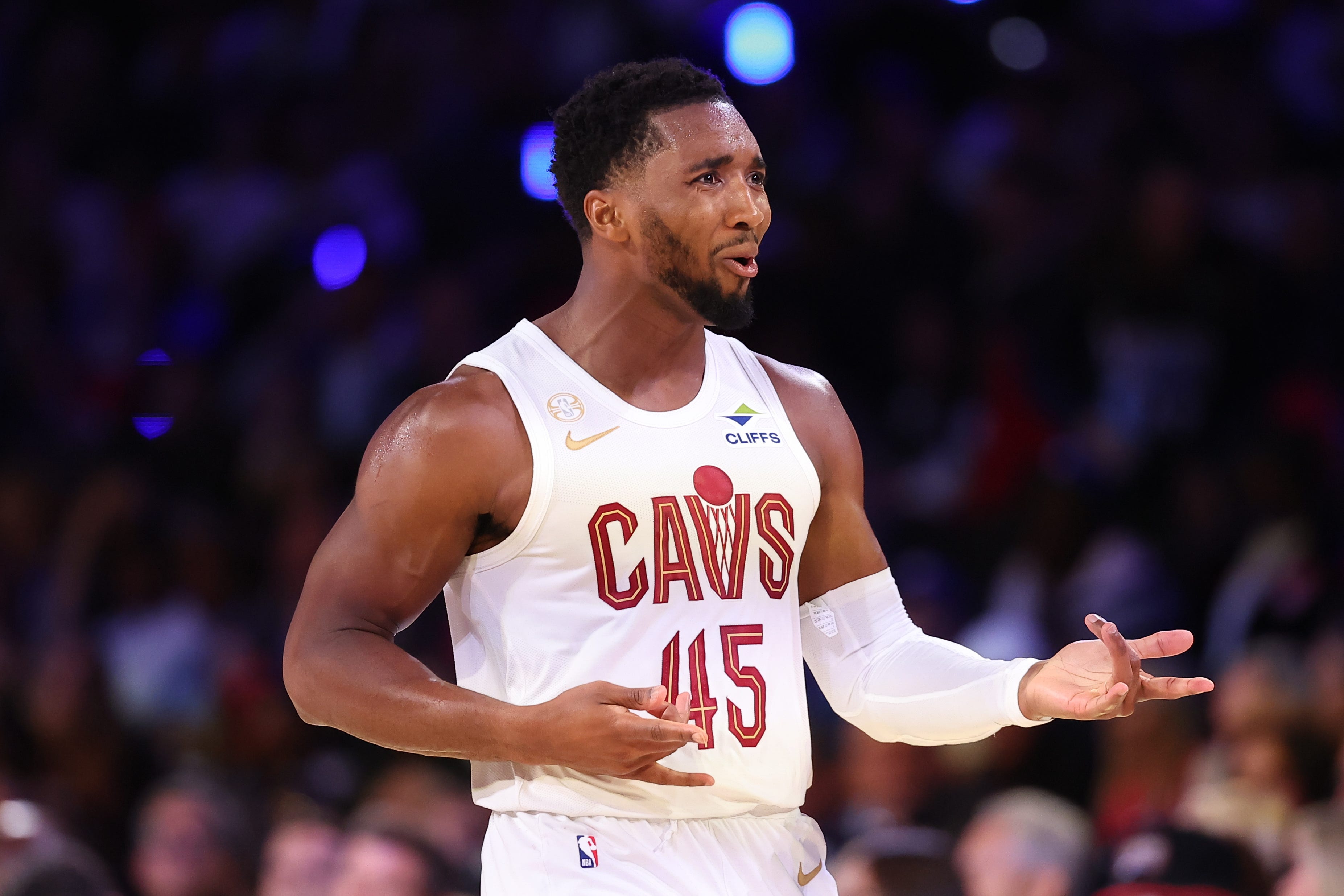 Oct 22, 2026; Philadelphia, Pennsylvania, USA; Cleveland Cavaliers guard Donovan Mitchell (45) reacts to his three pointer against the Philadelphia 76ers during the second quarter at Xfinity Mobile Arena. Mandatory Credit: Bill Streicher-Imagn Images