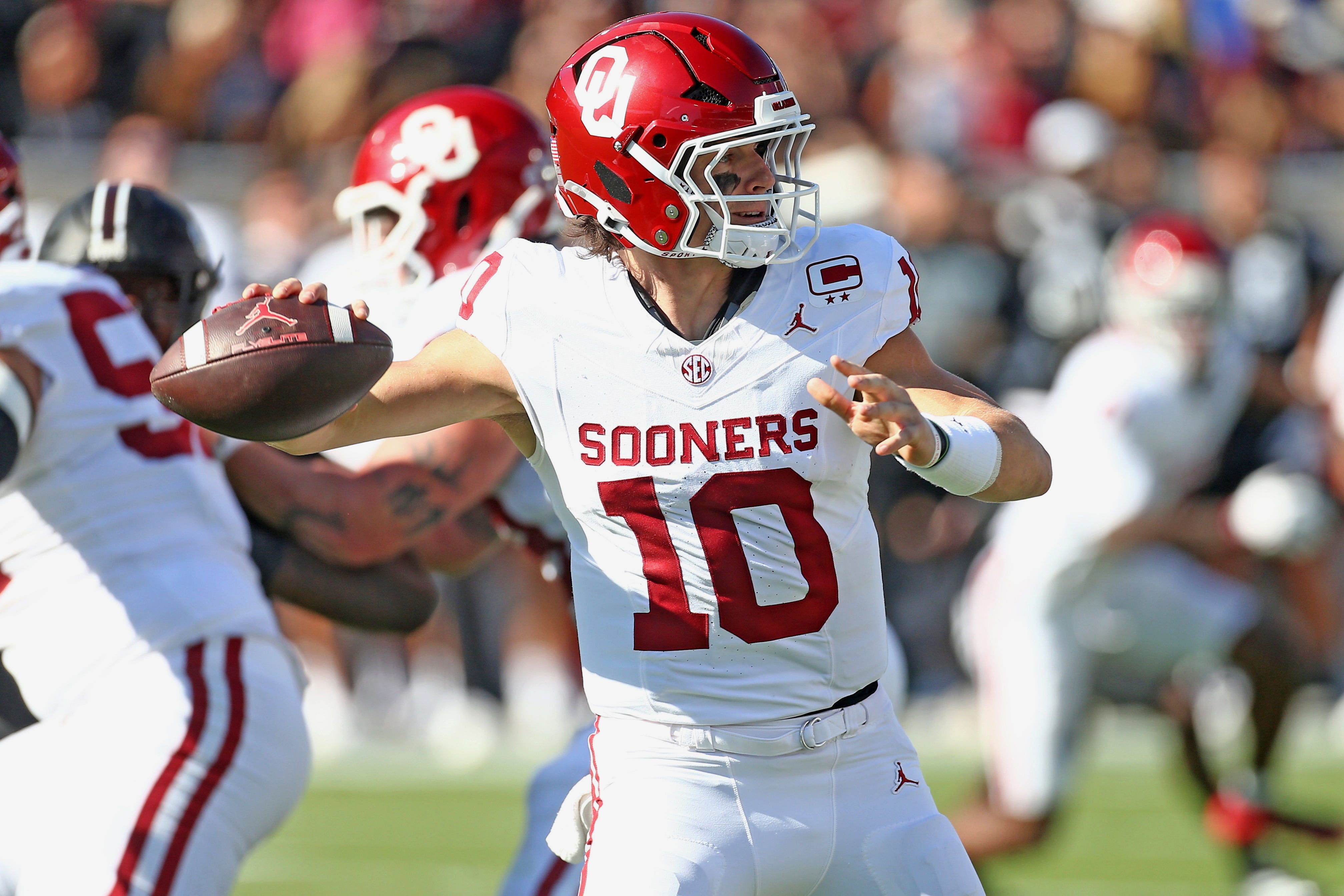 Oct 24, 2026; Starkville, Mississippi, USA;  Oklahoma Sooners quarterback John Mateer (10) passes the ball during the first quarter  against the Mississippi State Bulldogs at Davis Wade Stadium at Scott Field.  Mandatory Credit: Petre Thomas-Imagn Images