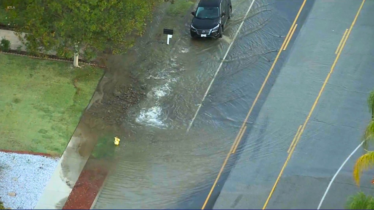 Flooding, outages in Woodland Hills after water main ruptures - AOL