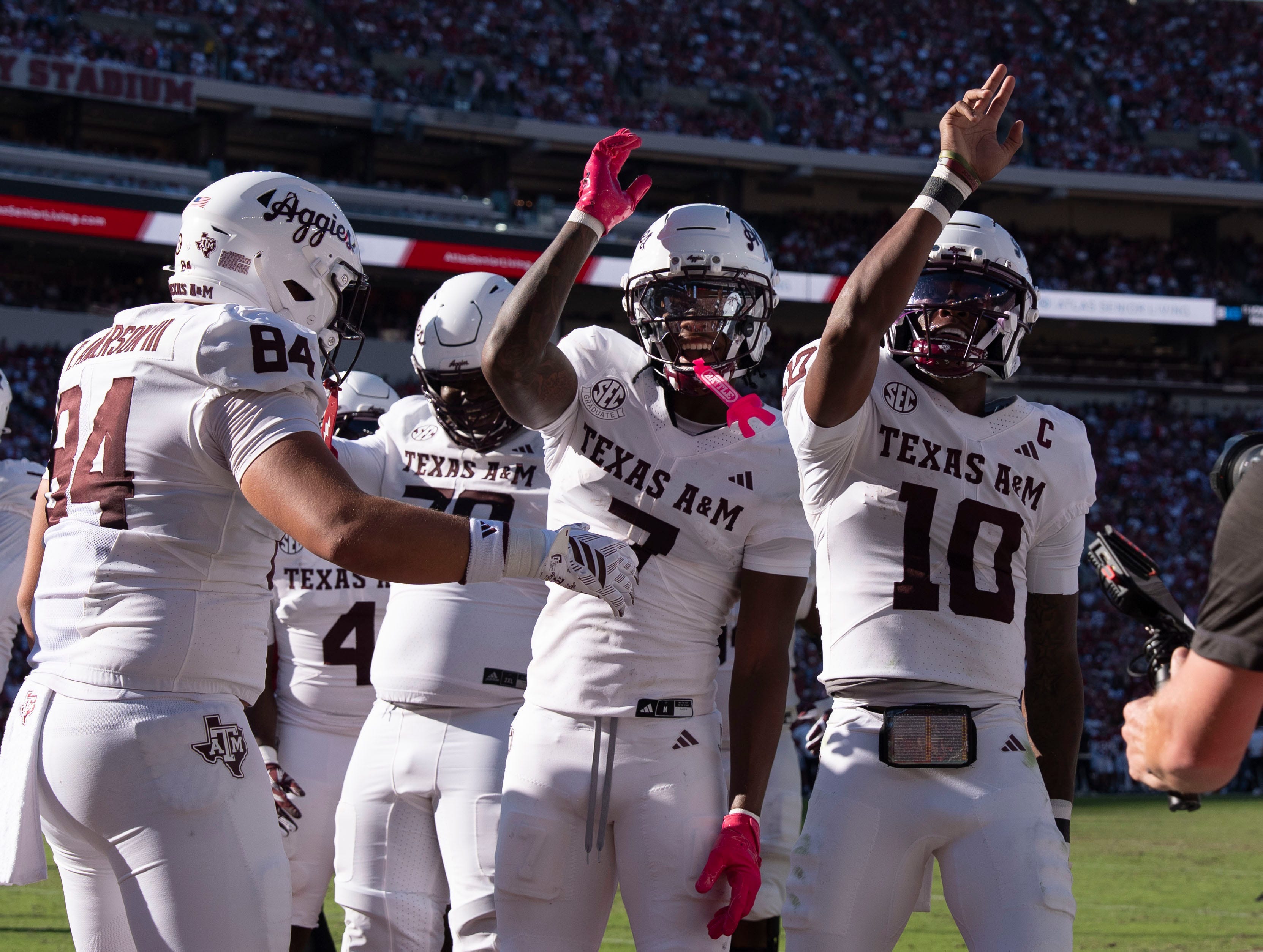 Oct 24, 2026; Tuscaloosa, AL, USA;  Texas A&amp;M quarterback Marcel Reed (10) celebrates his running touchdown with teammates during the game with Alabama at Saban Field at Bryant Denny Stadium. Mandatory Credit: Gary Cosby Jr.-Tuscaloosa News