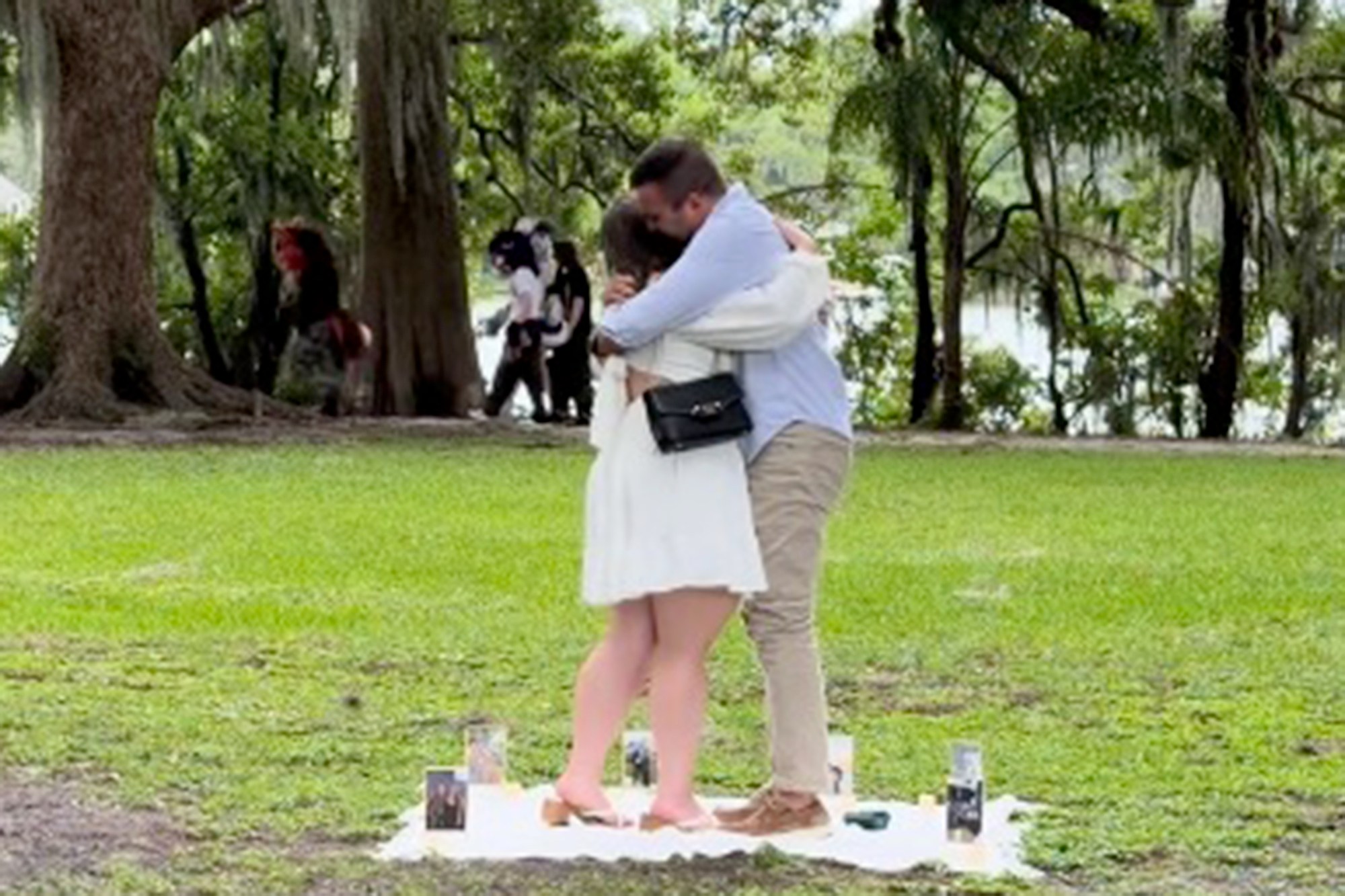 Romantic park proposal divides internet as ‘furries’ photobomb couple ...
