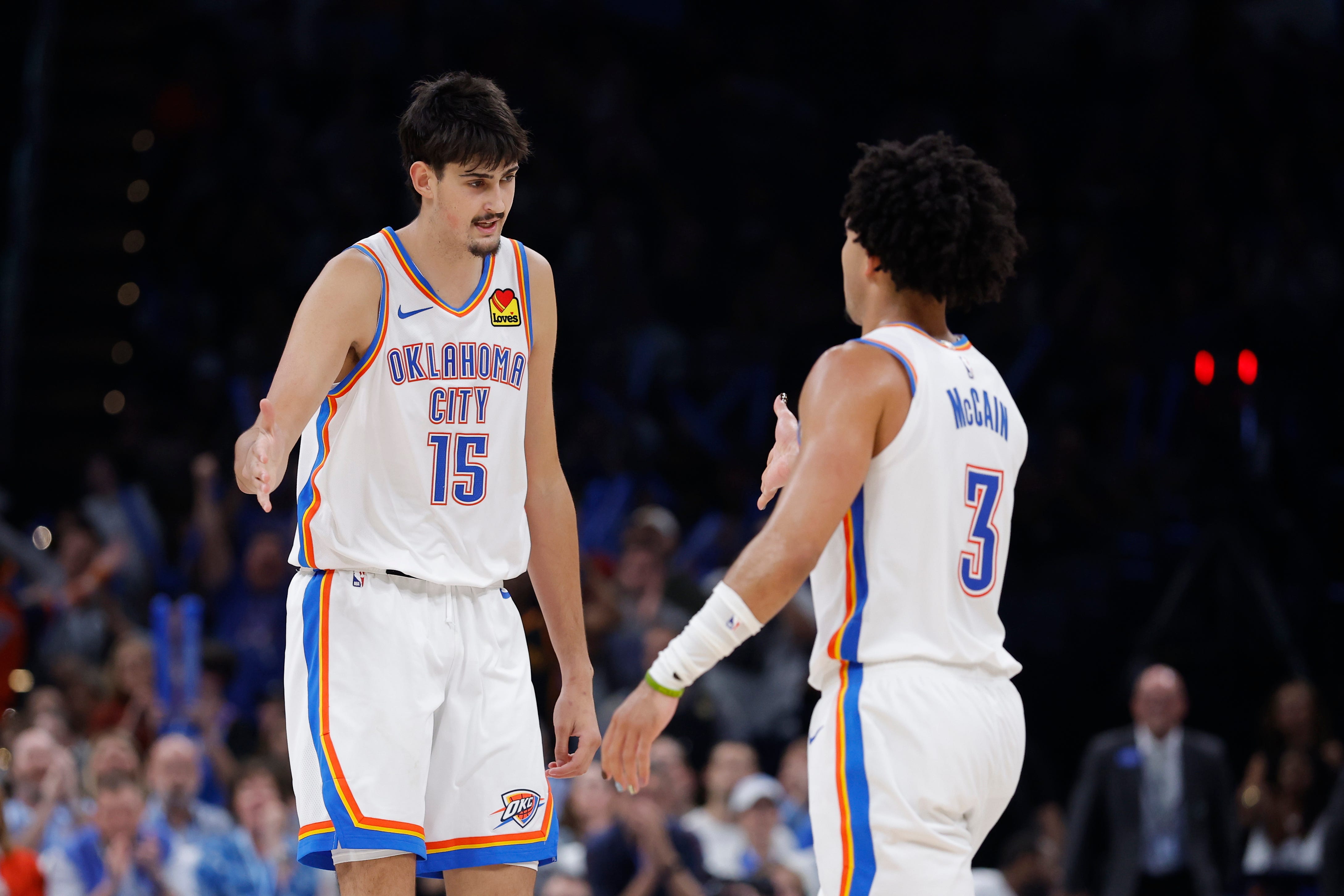 Oct 26, 2026; Oklahoma City, Oklahoma, USA; Oklahoma City Thunder center Aday Mara (15) and guard Jared McCain (3) celebrate after a play against the Phoenix Suns during the second half at Paycom Center. Mandatory Credit: Alonzo Adams-Imagn Images